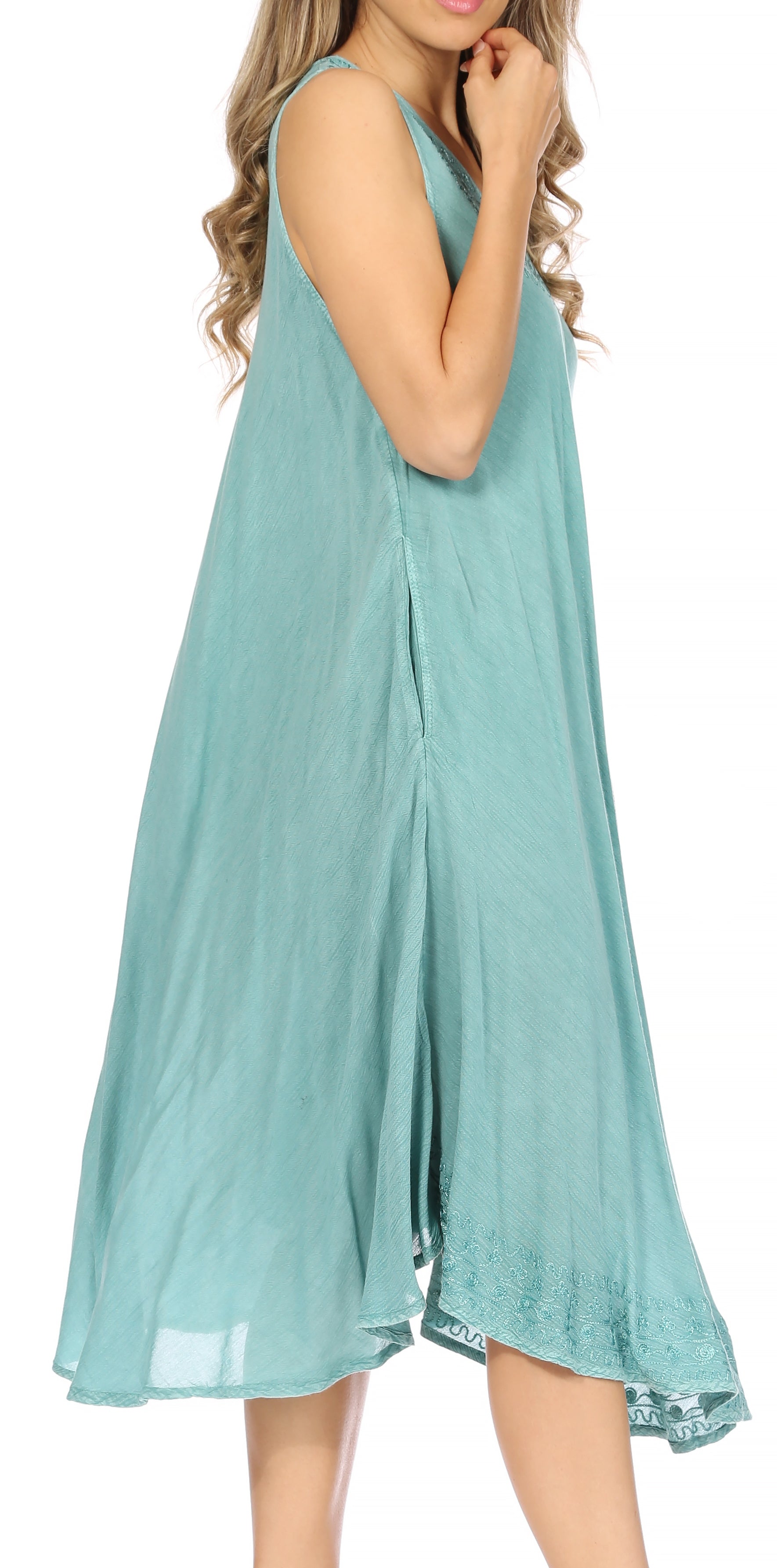 Woman wearing a light blue dress on a white background