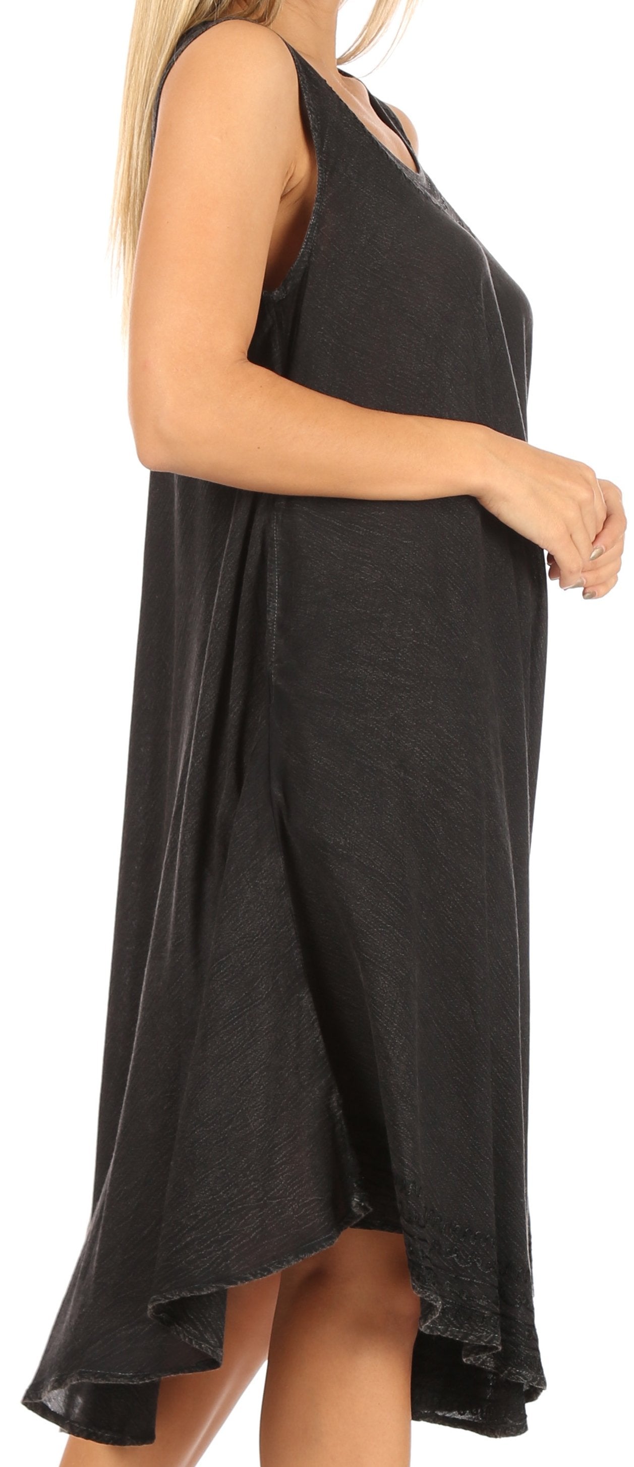 Black sleeveless dress worn by a model on a white background