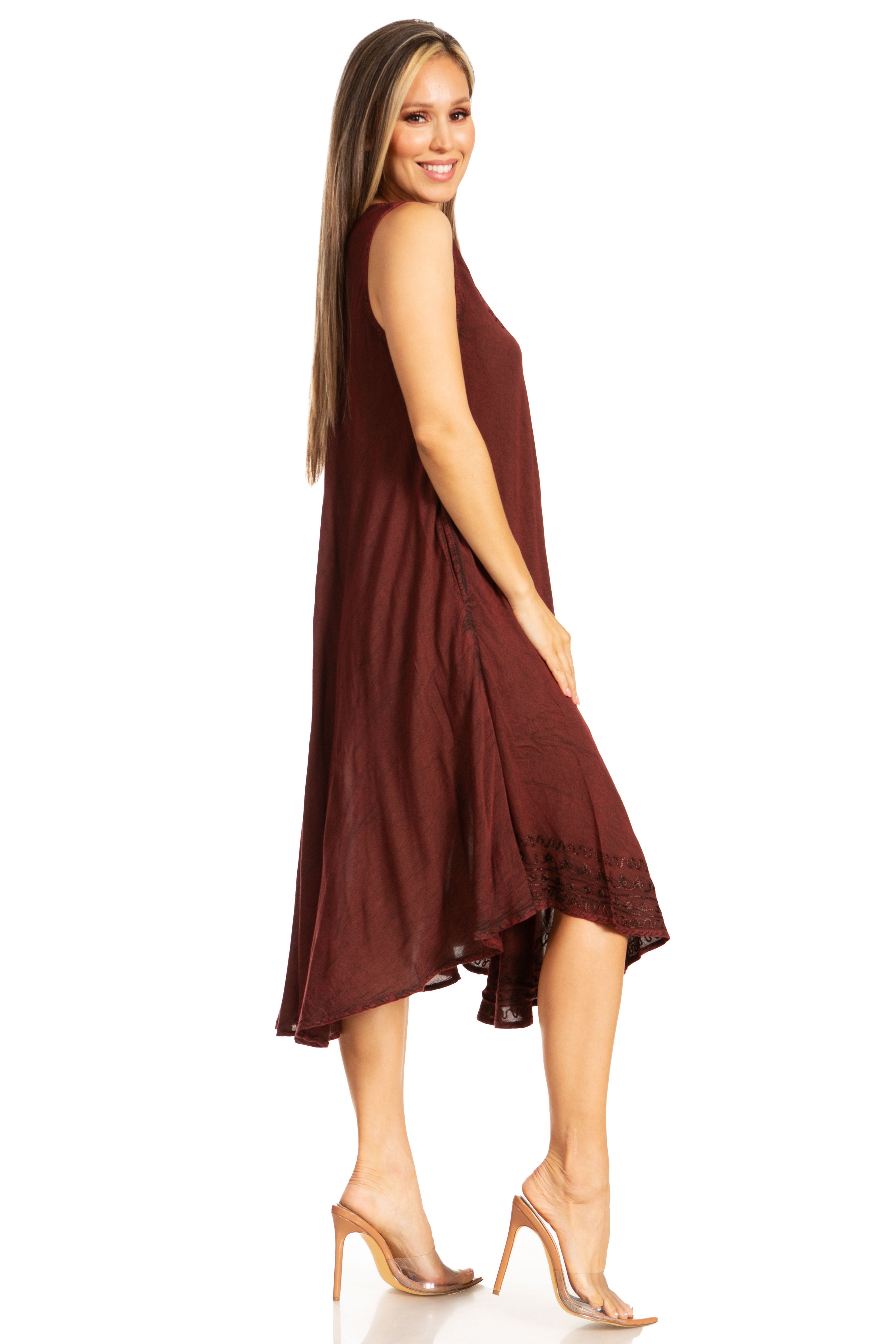 Woman wearing a brown sleeveless dress on a white background