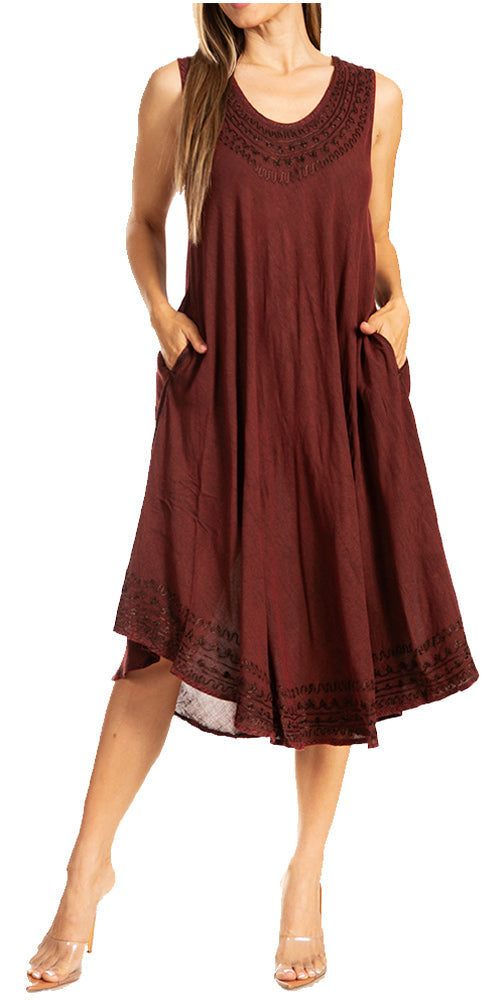 Brown sleeveless dress with lace details on a white background