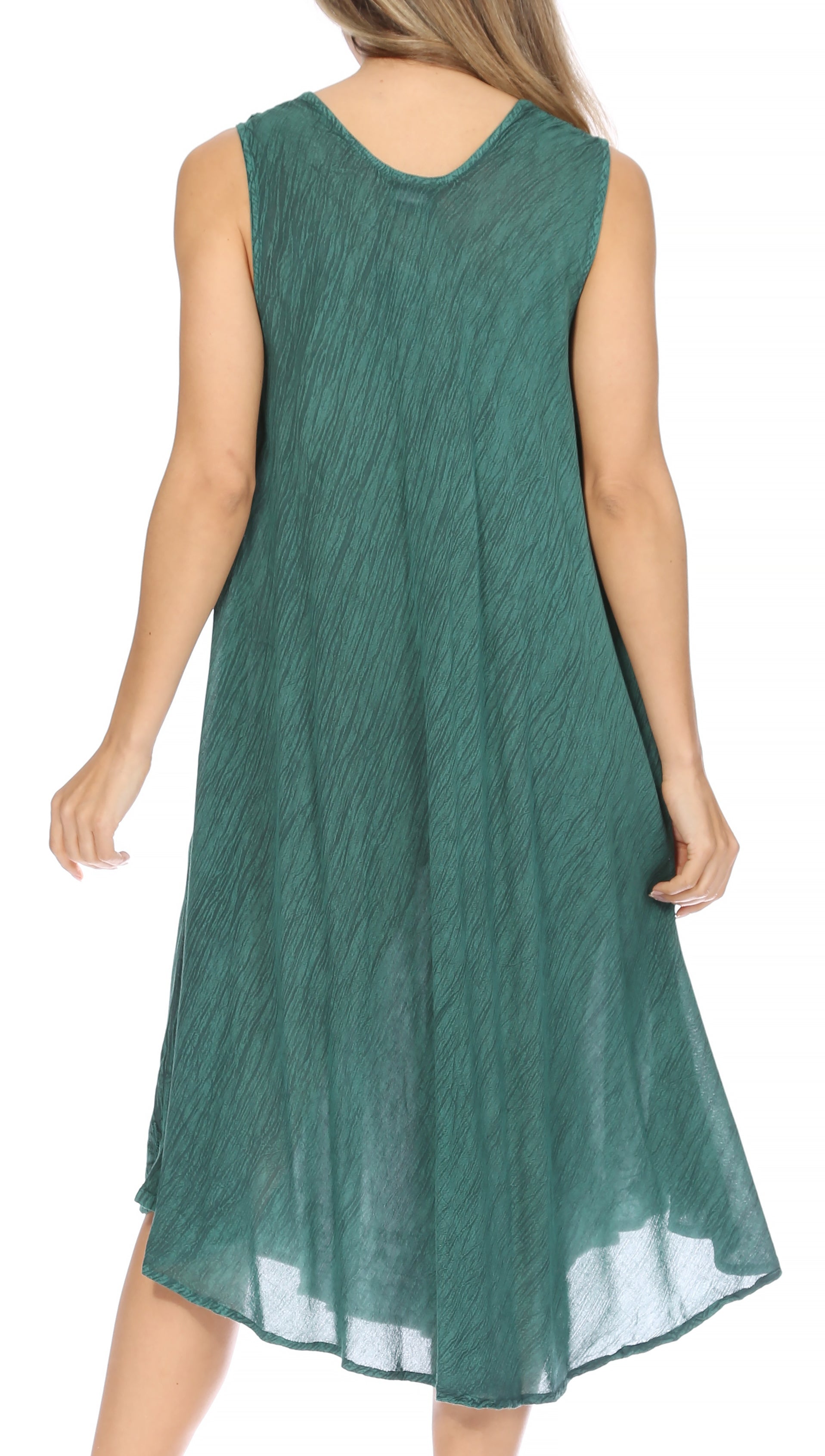 Green dress worn by a person on a white background