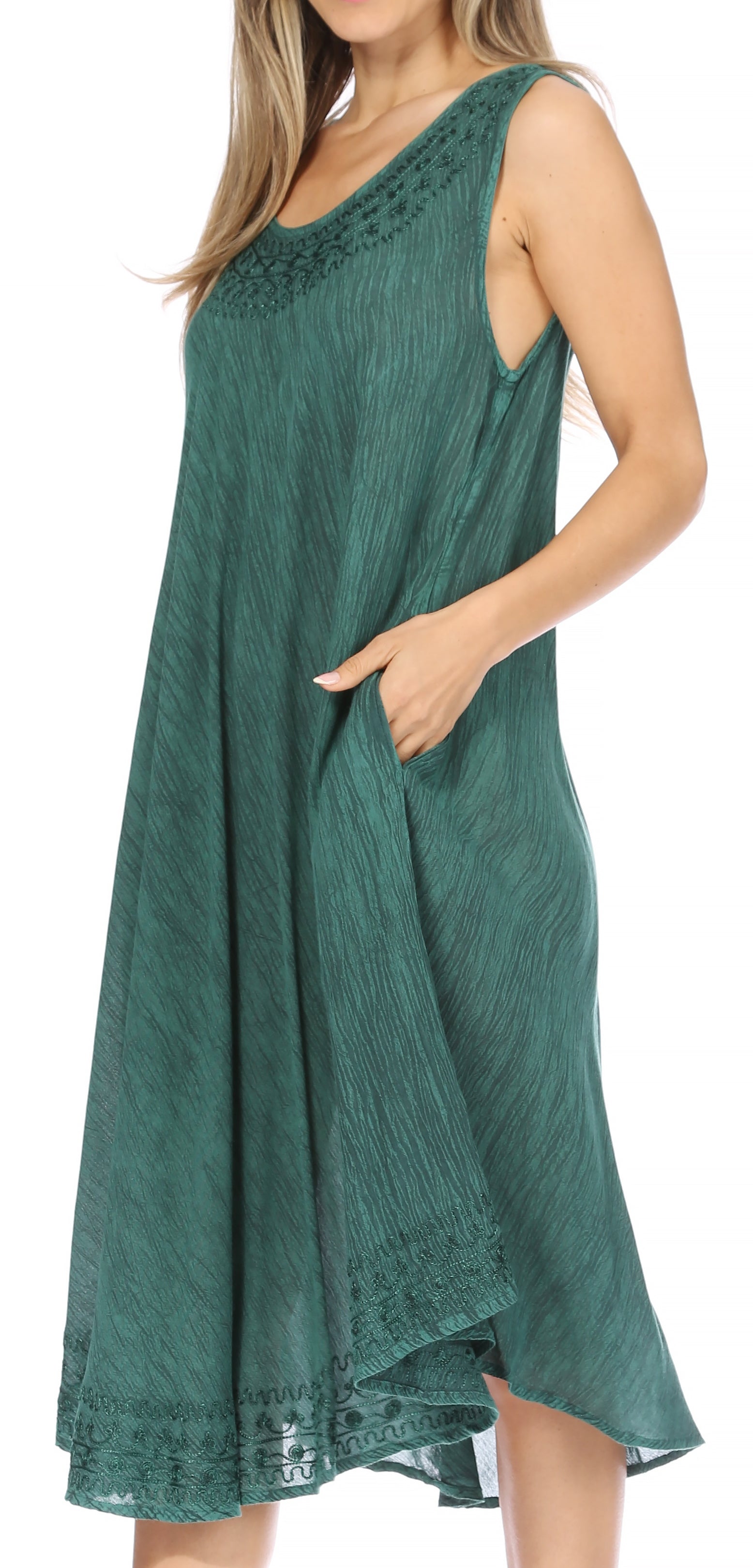 Green dress with lace details on a white background