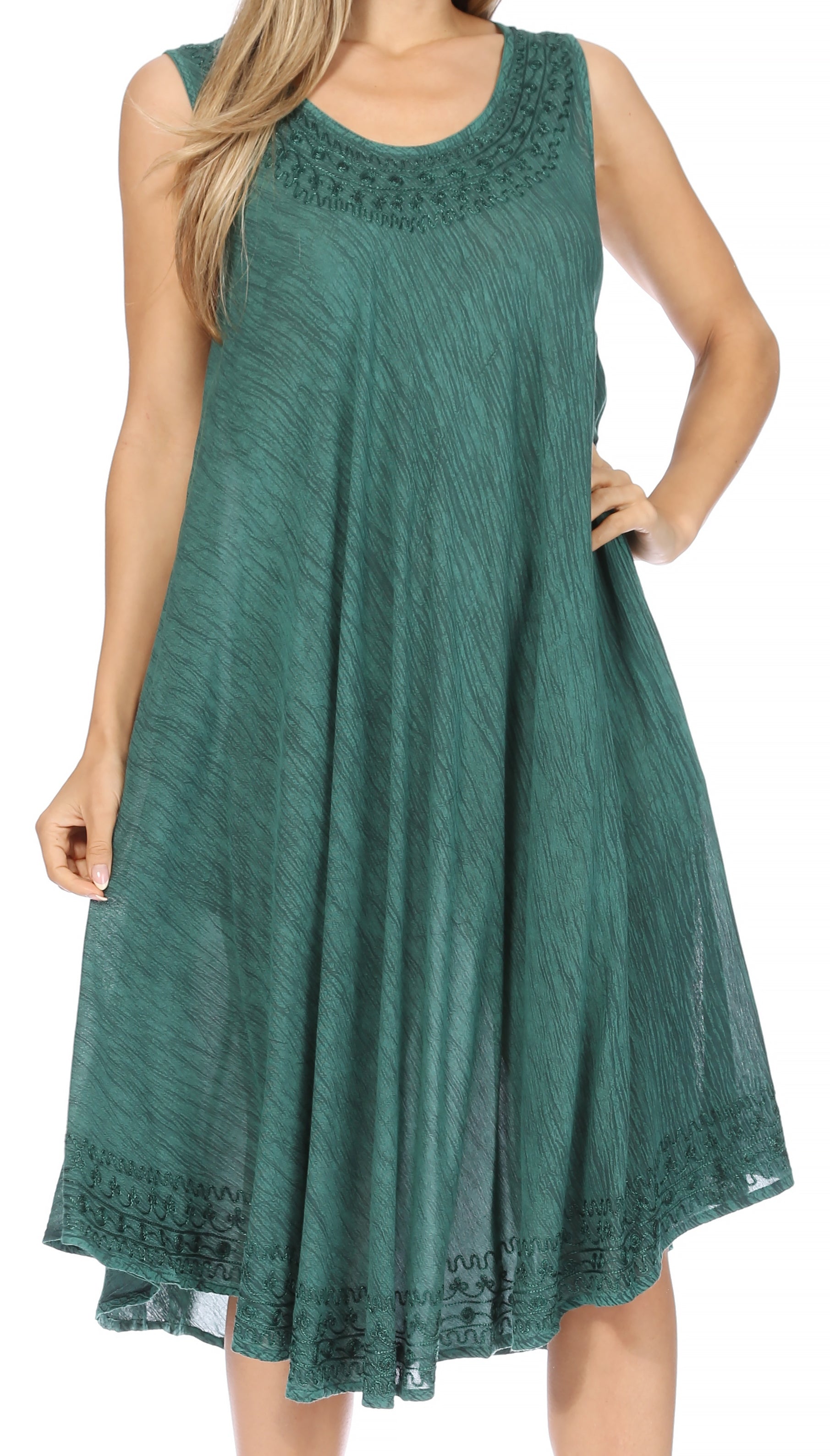 Green sleeveless dress with lace details on a white background