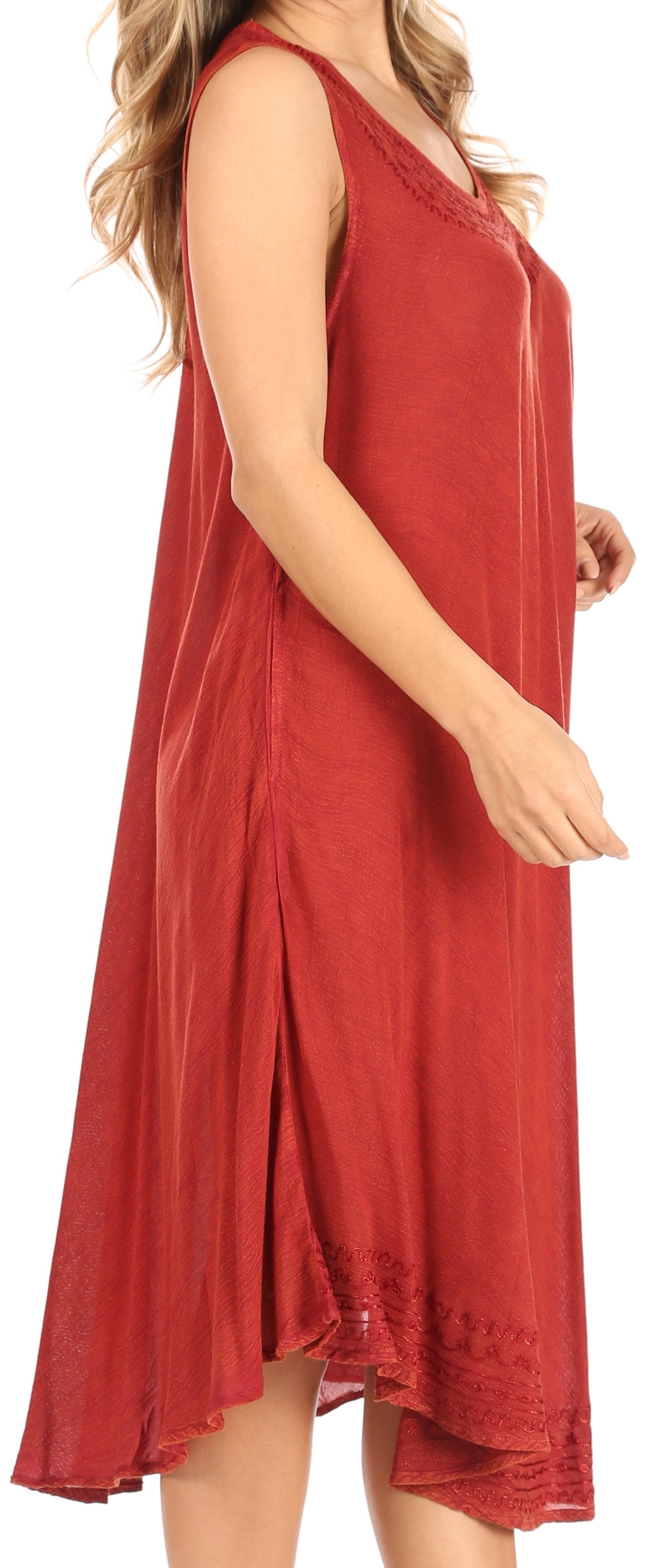 Red sleeveless dress worn by a person on a white background