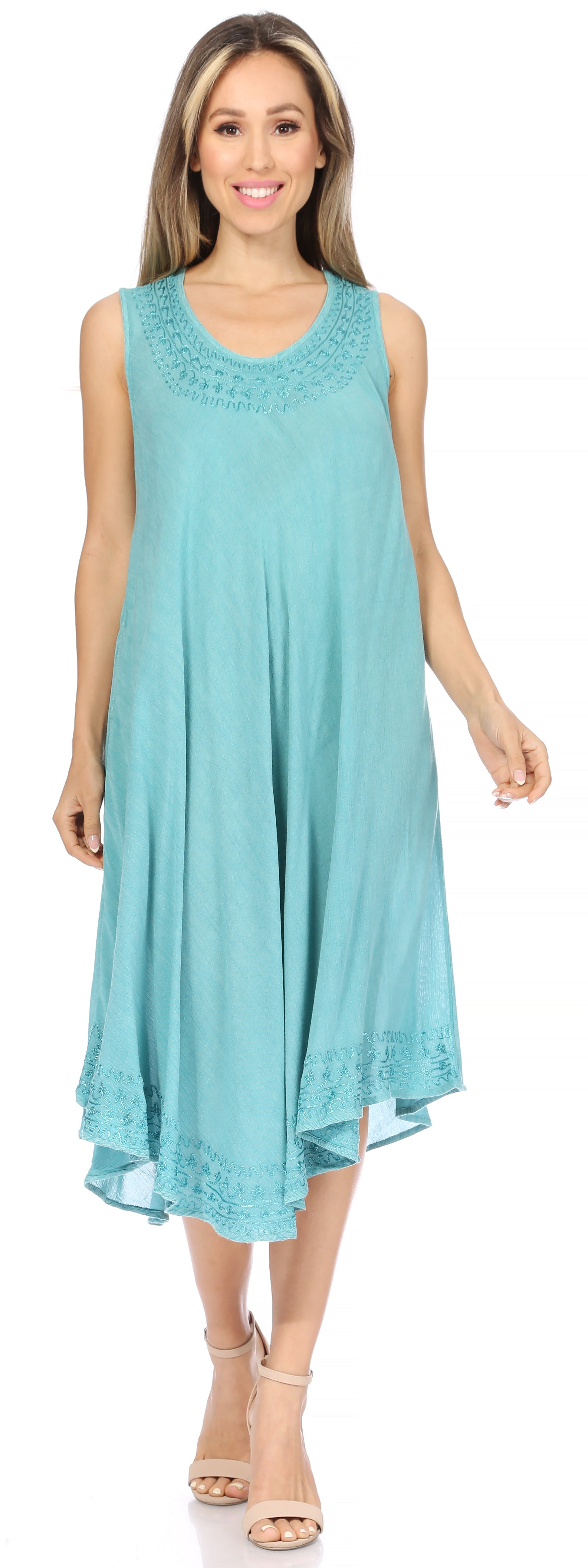 Woman wearing a light blue sleeveless dress on a white background