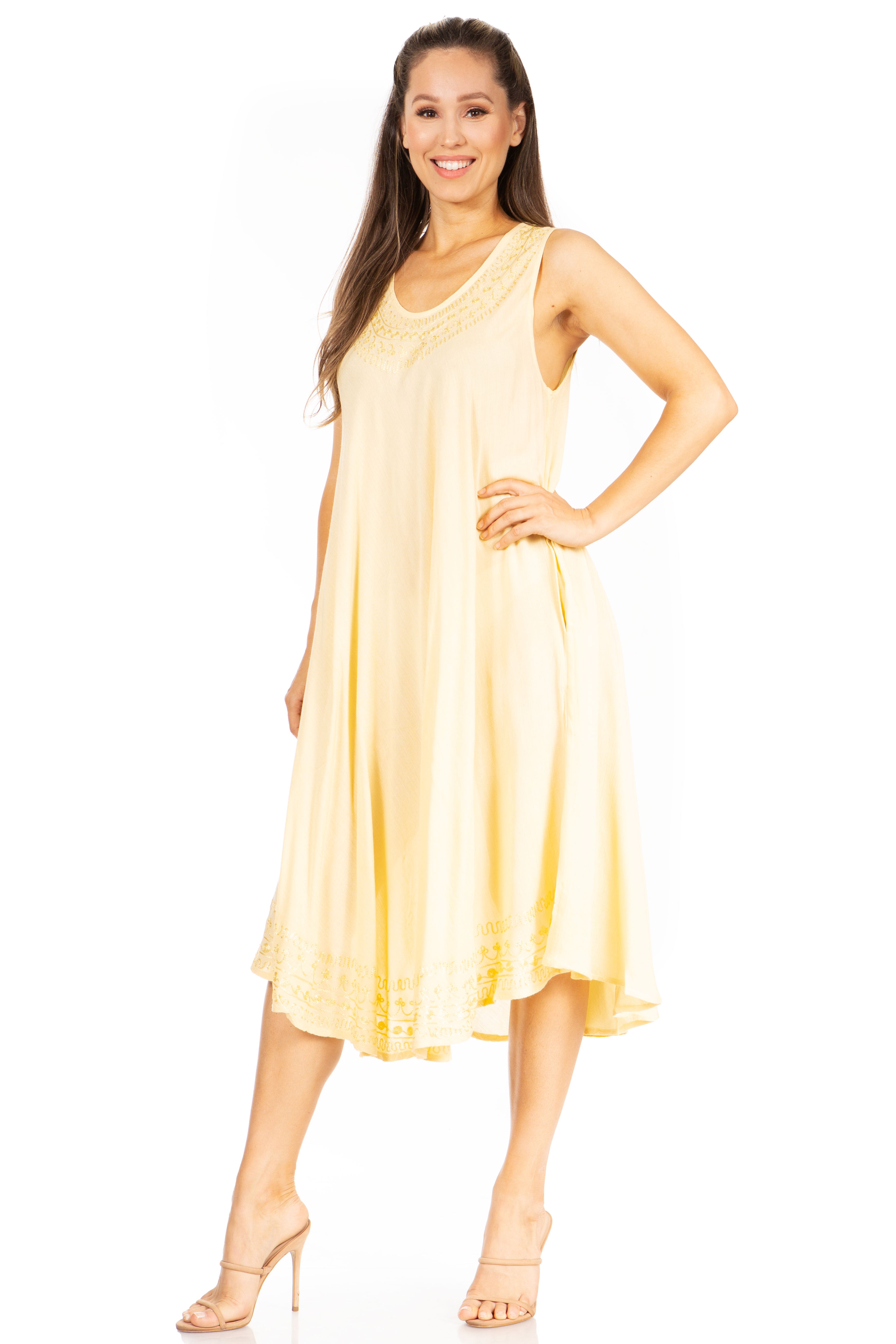 Woman wearing a yellow dress on a white background