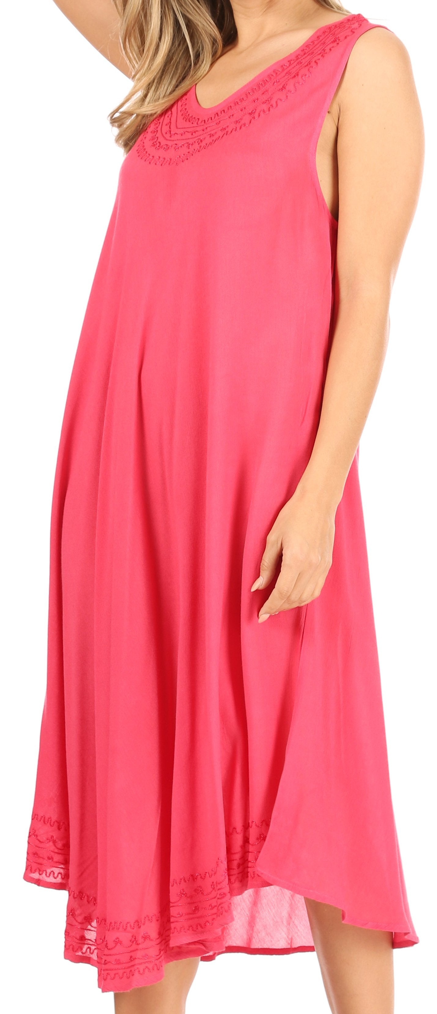 Pink sleeveless dress with lace details on a white background