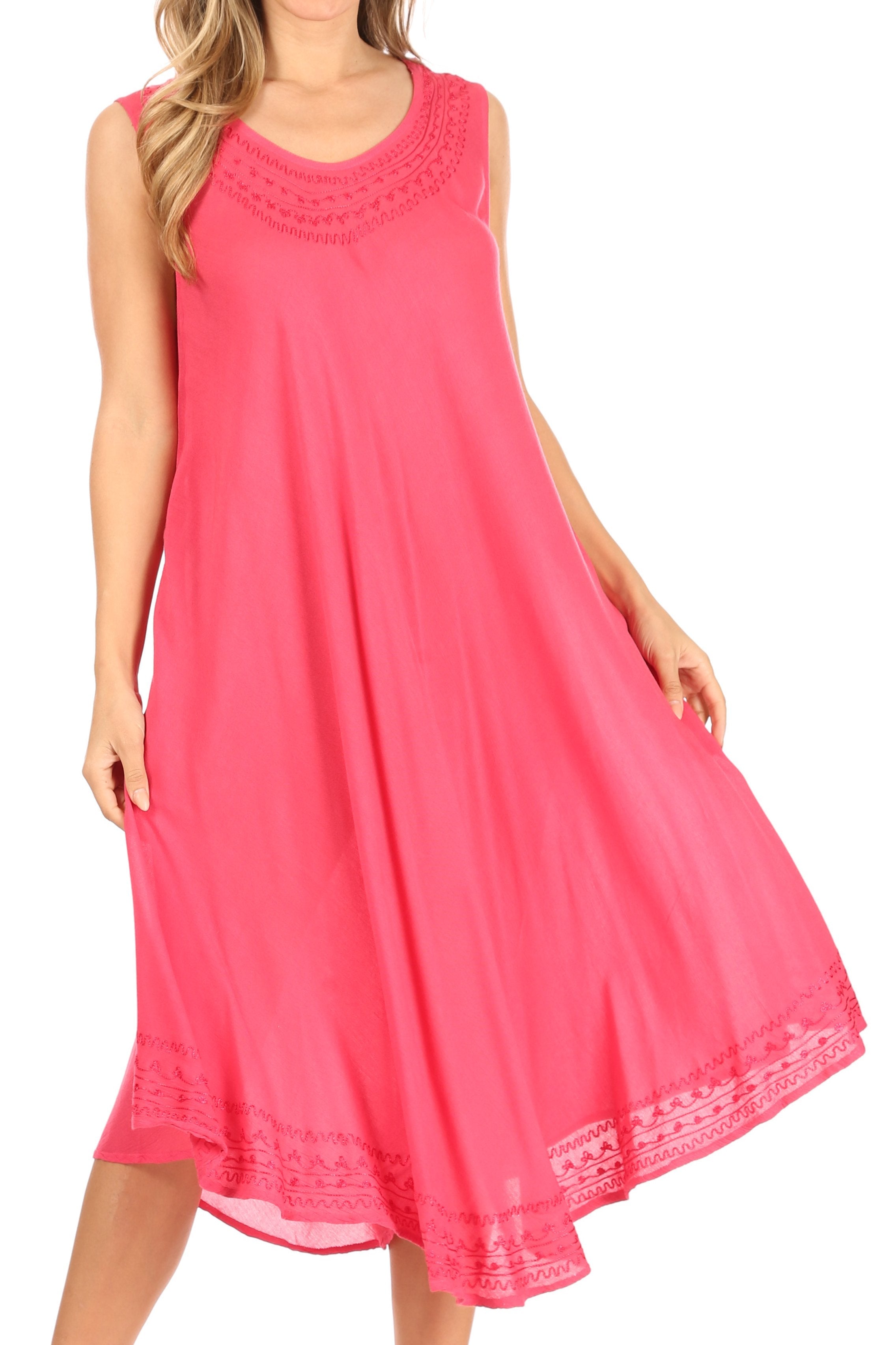 Pink sleeveless dress with lace details on a white background