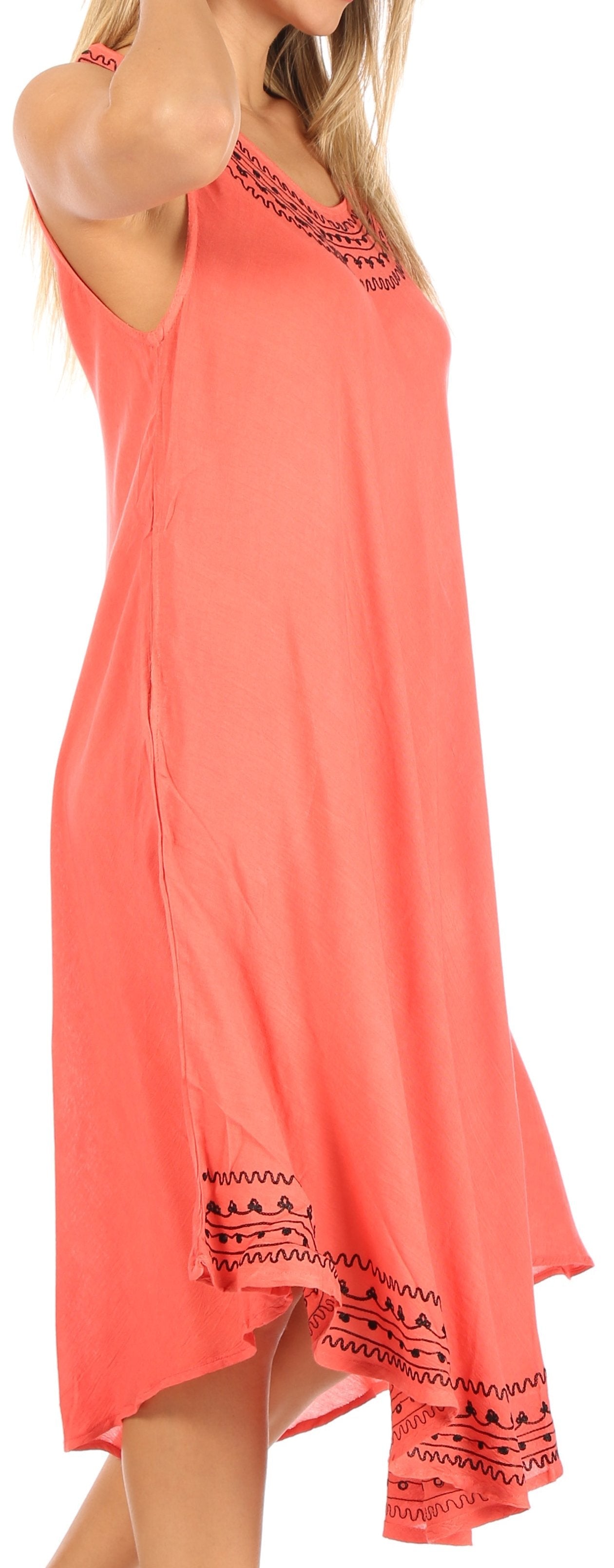 Coral dress with black embroidery on a white background