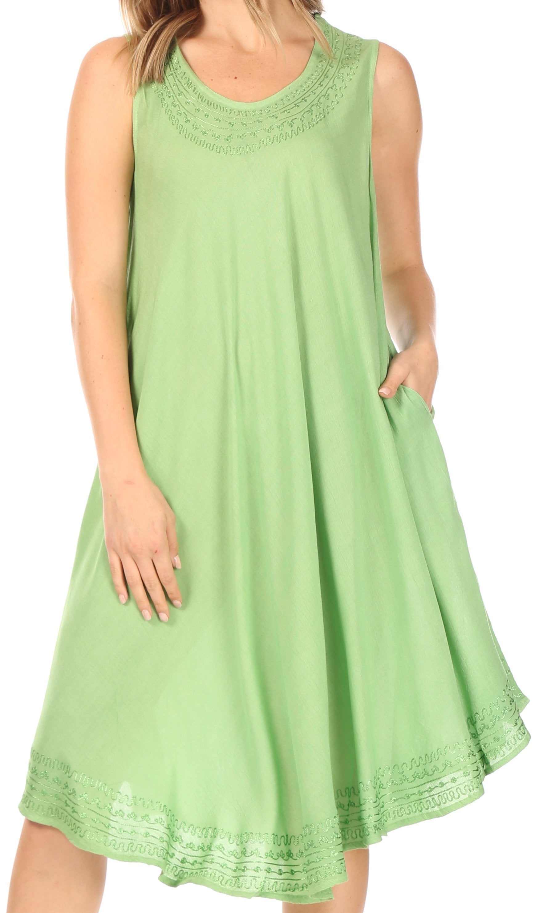 Green dress with lace details on a white background