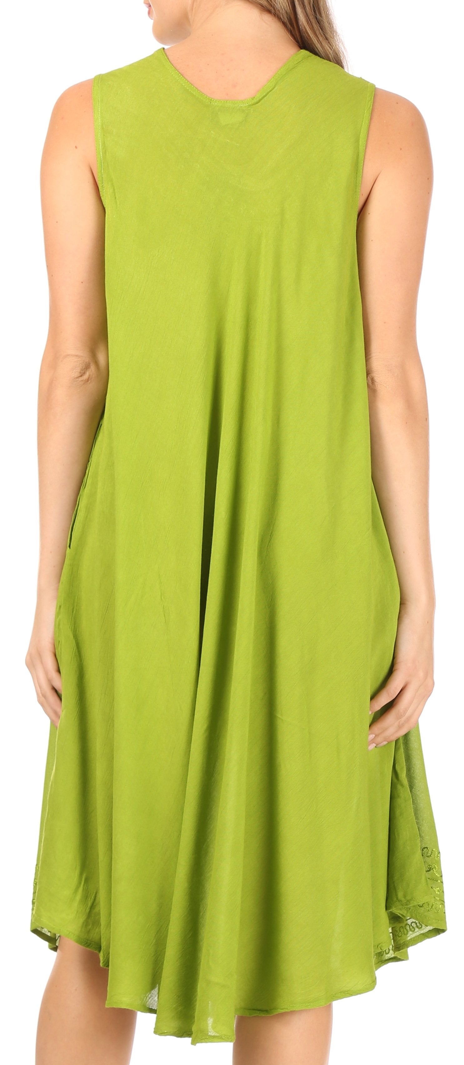 Green sleeveless dress worn by a person on a white background