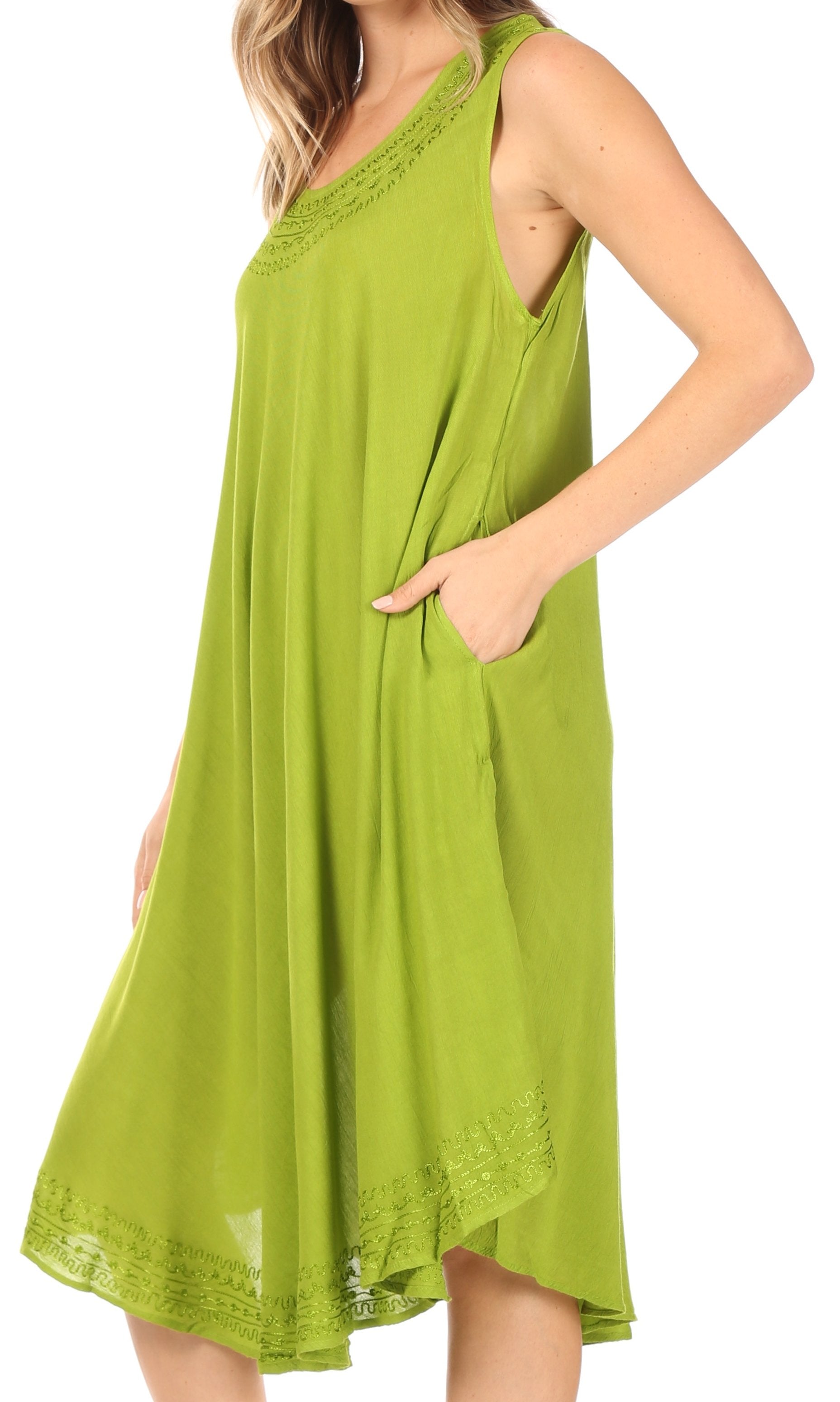 Green dress with lace trim on a white background