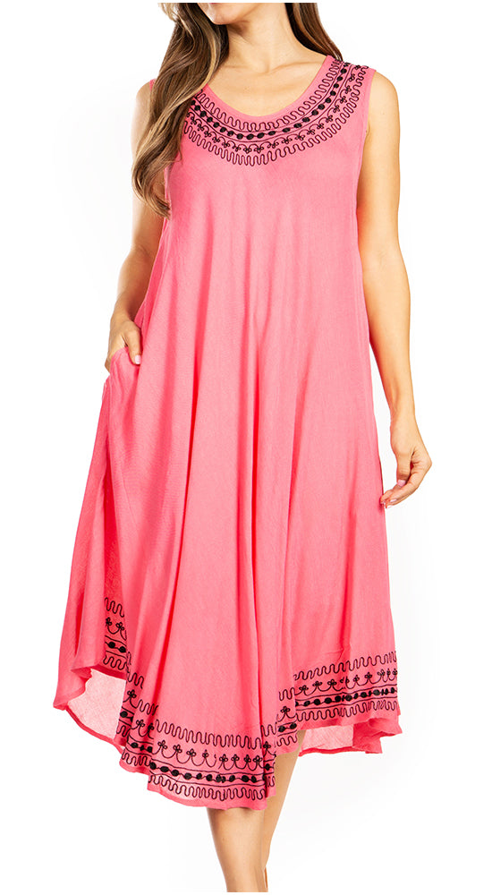 Pink dress with black embroidery on a white background