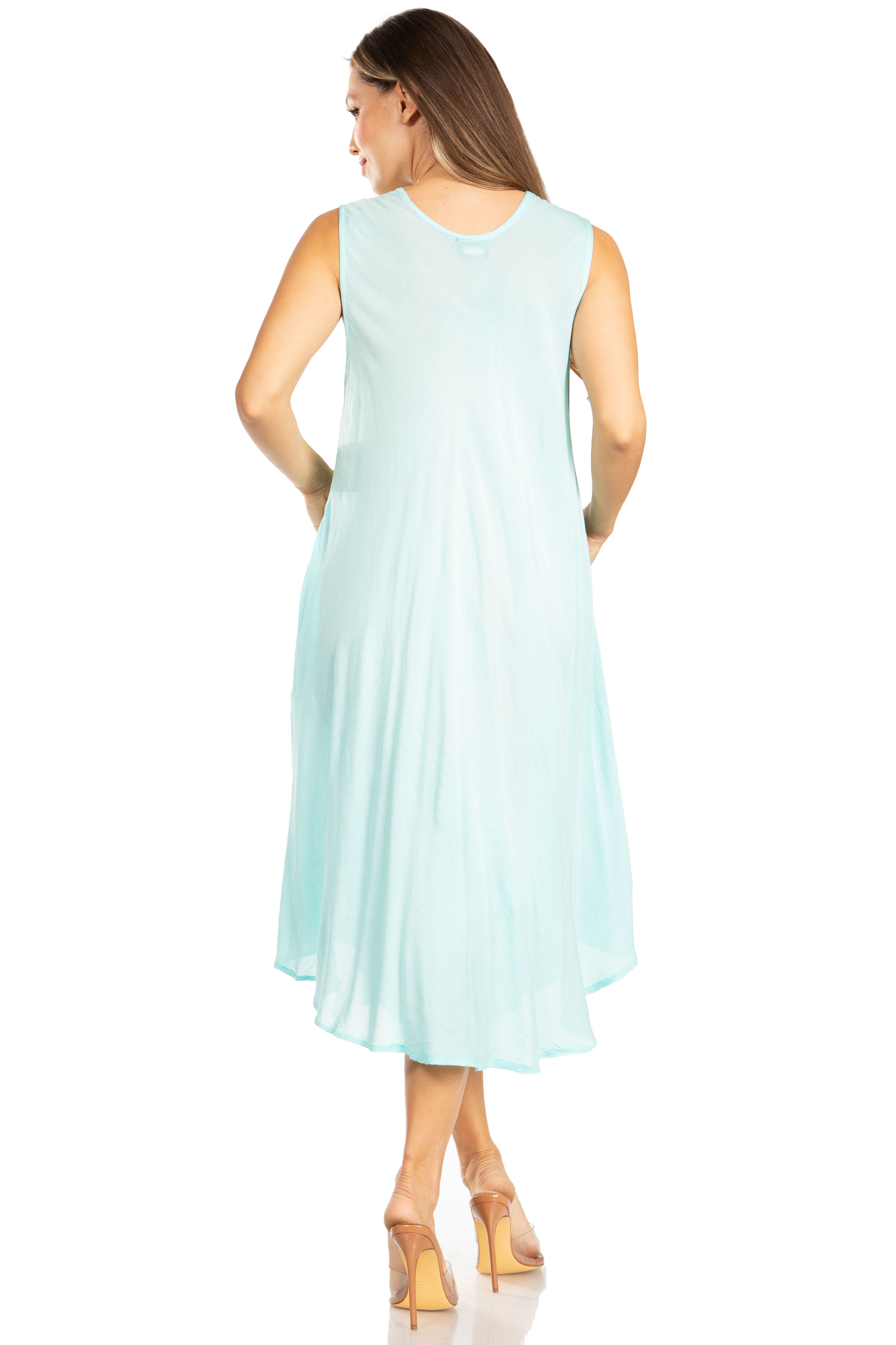 Woman wearing a light blue dress on a white background