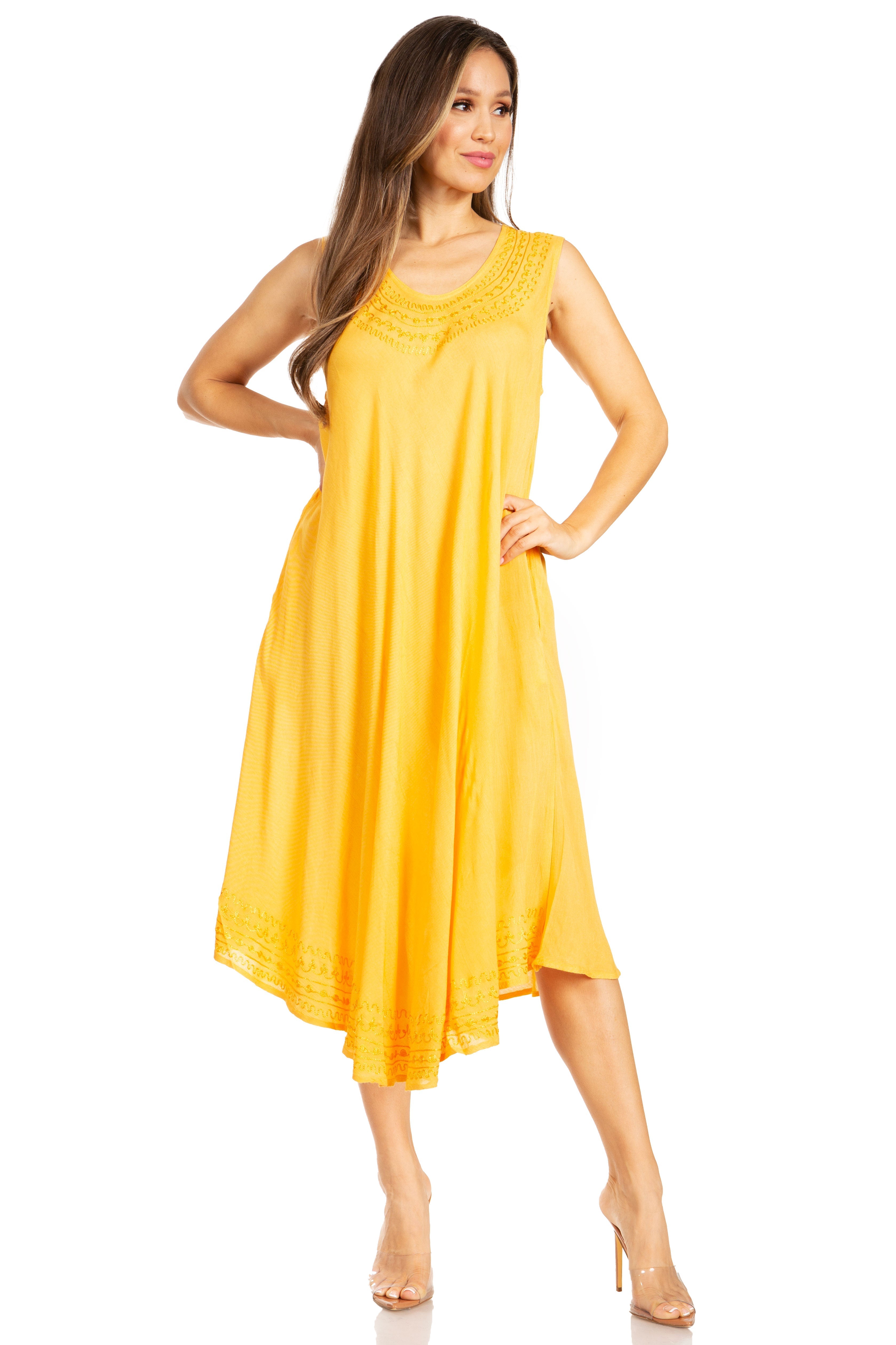 Woman wearing a yellow dress on a white background