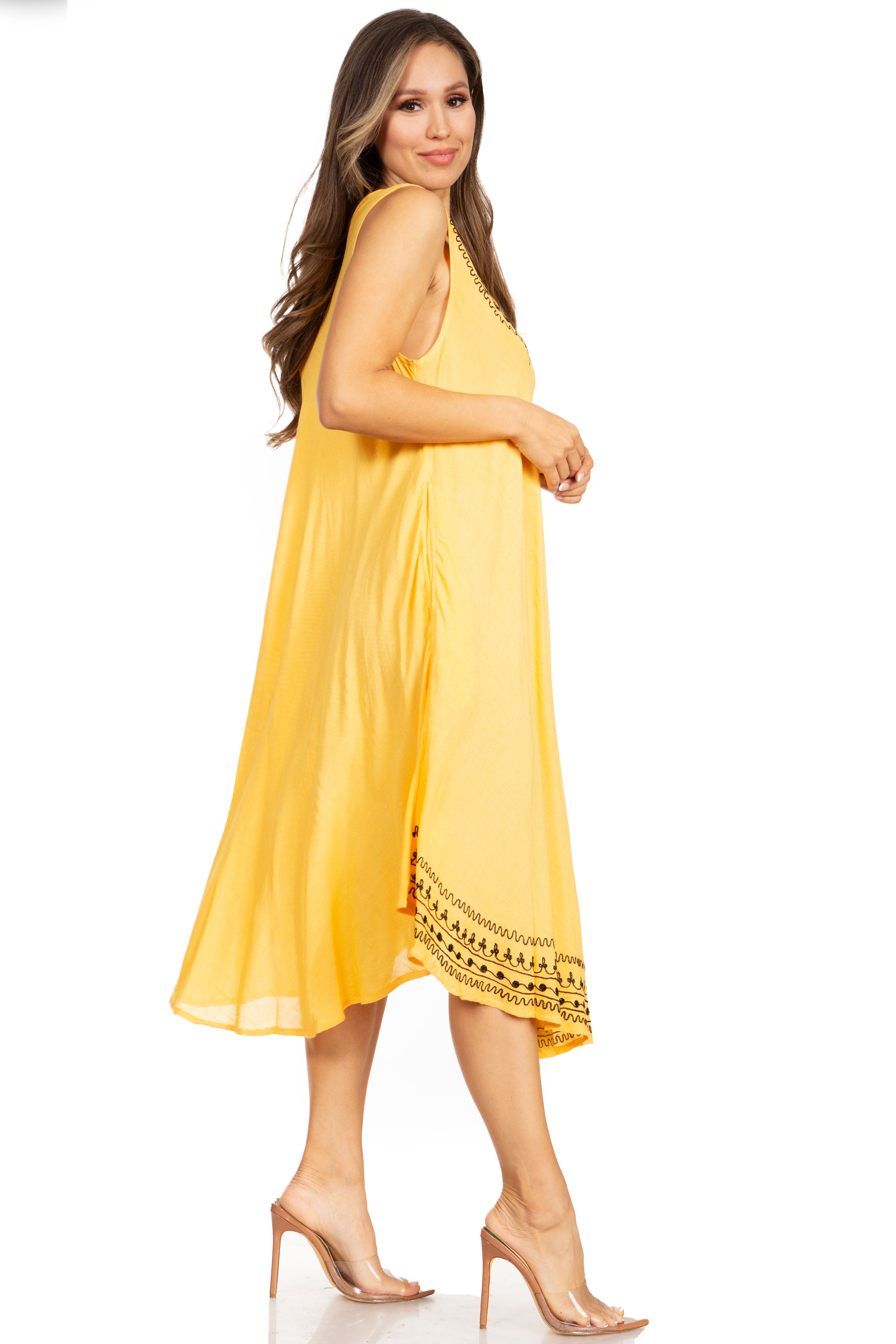 Woman wearing a yellow dress with a white background