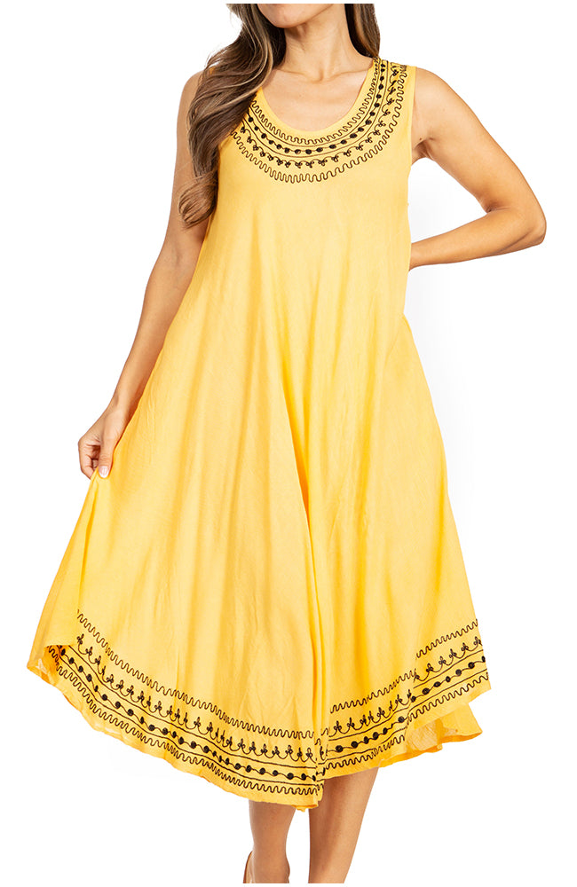 Yellow dress with black embroidery on a white background