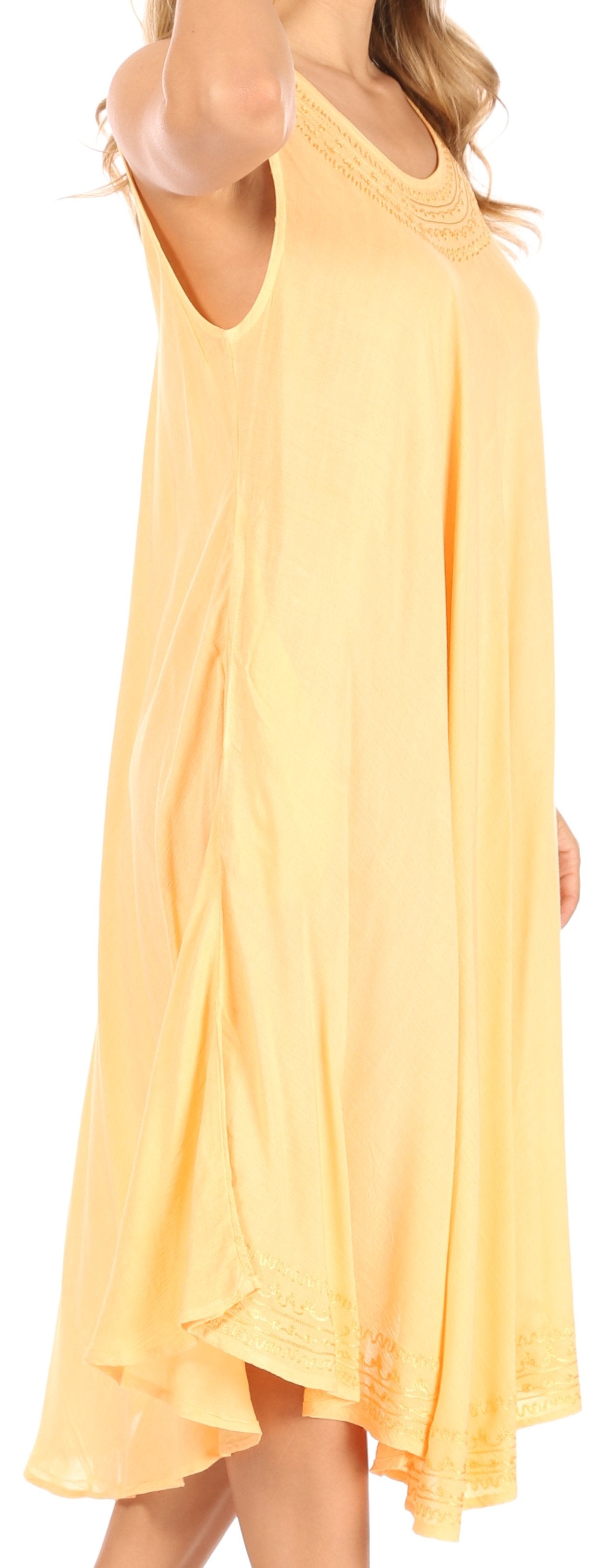 Yellow sleeveless dress worn by a person on a white background