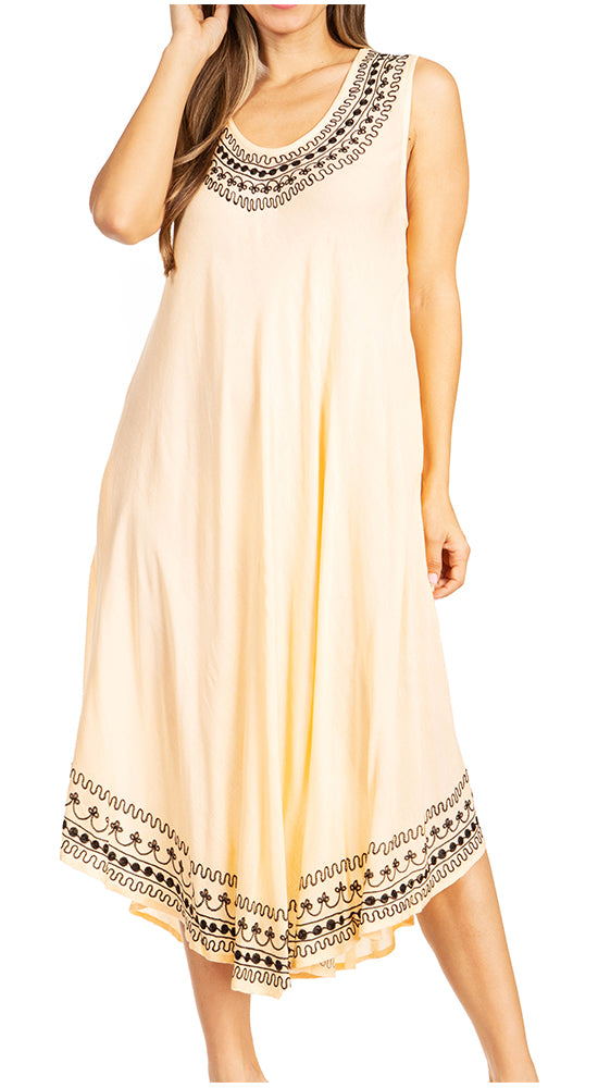 Beige sleeveless dress with black lace details on a white background