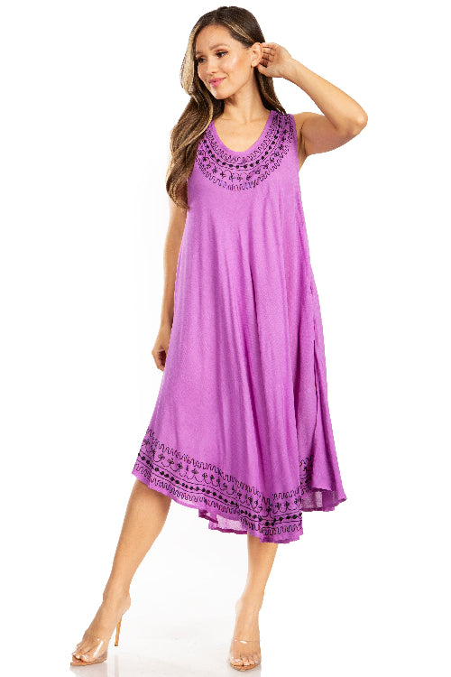 Woman wearing a purple dress with lace details on a white background