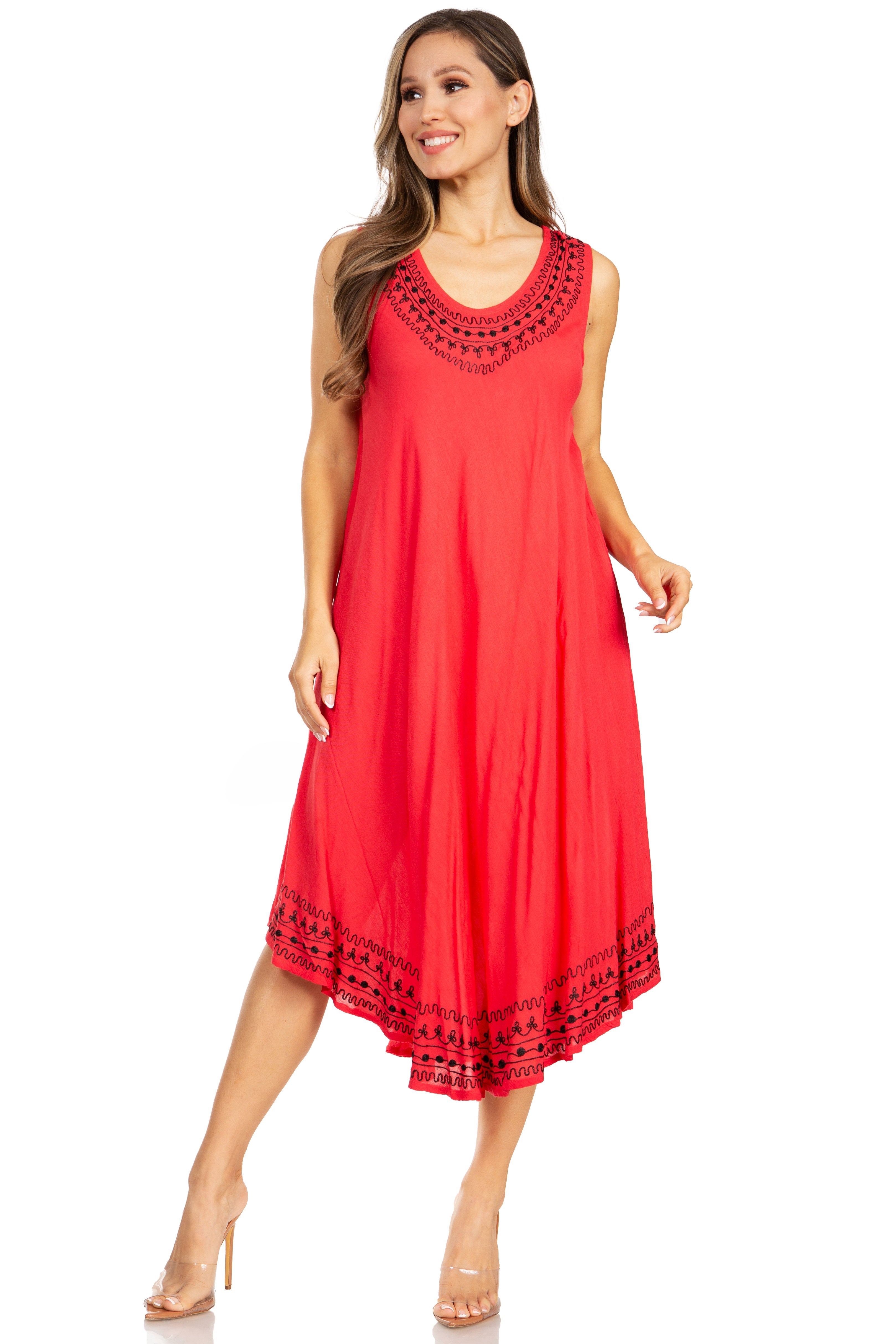Woman wearing a red dress with lace details on a white background