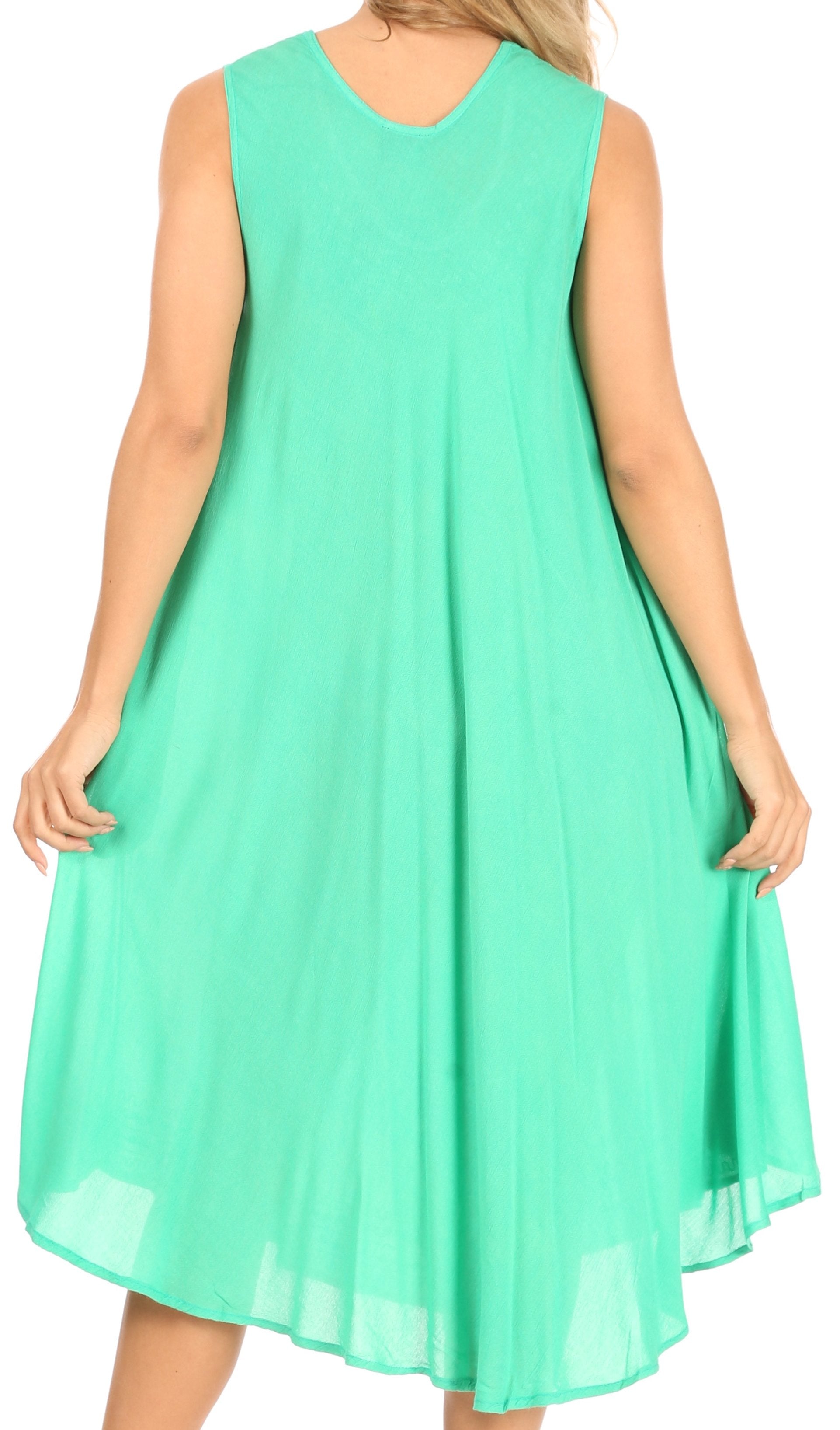 Mint green sleeveless dress worn by a person on a white background
