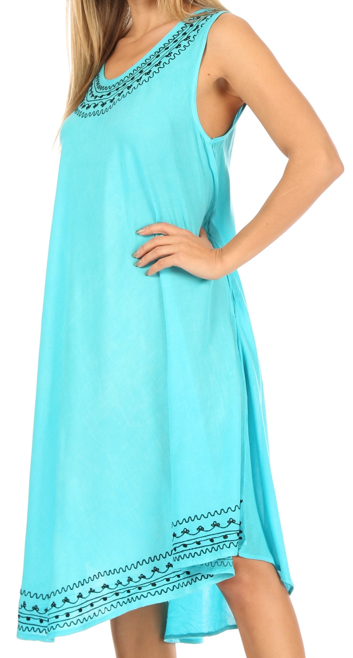 Light blue dress with embroidery details on a white background