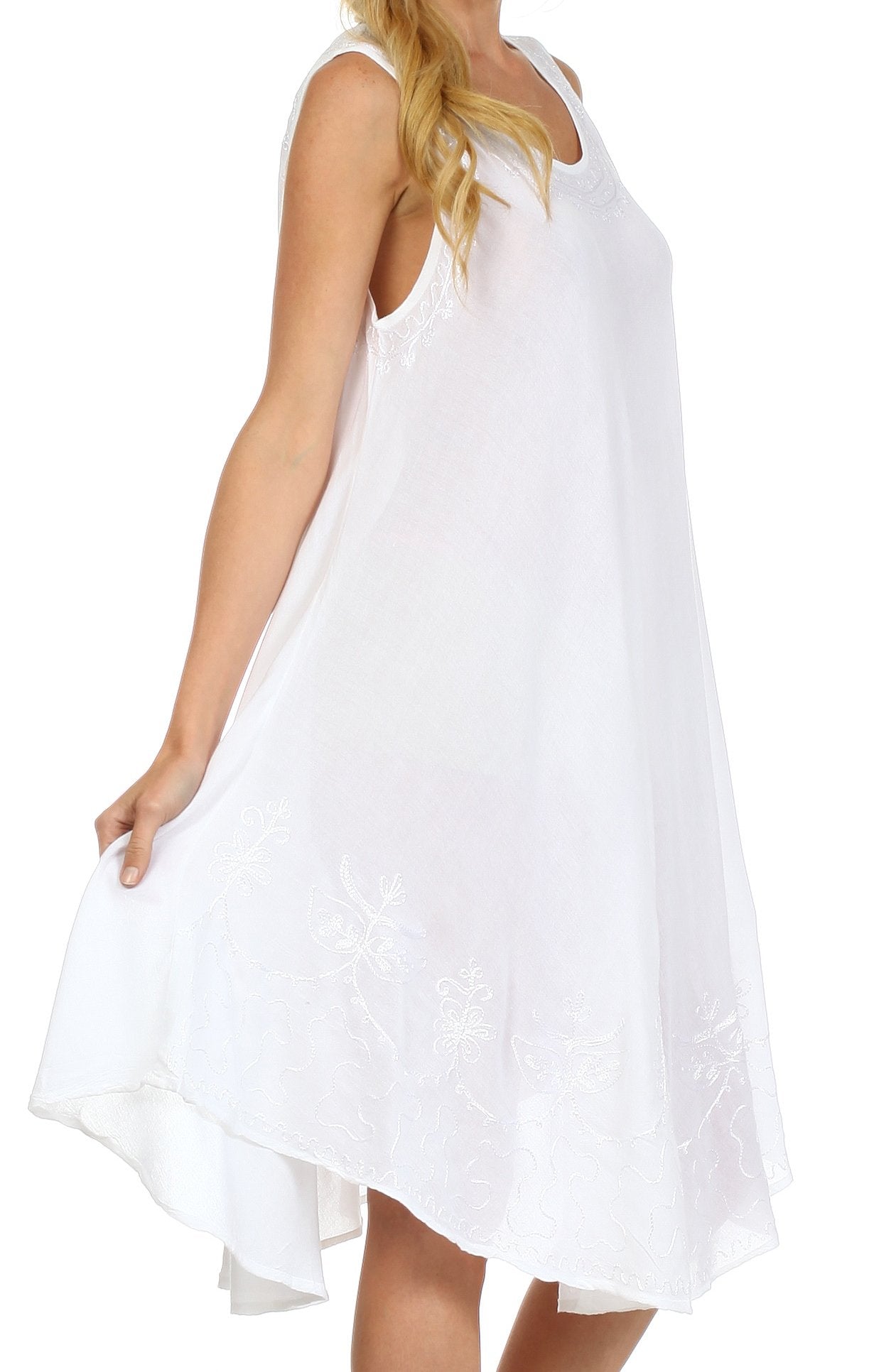 White sleeveless dress worn by a person on a white background