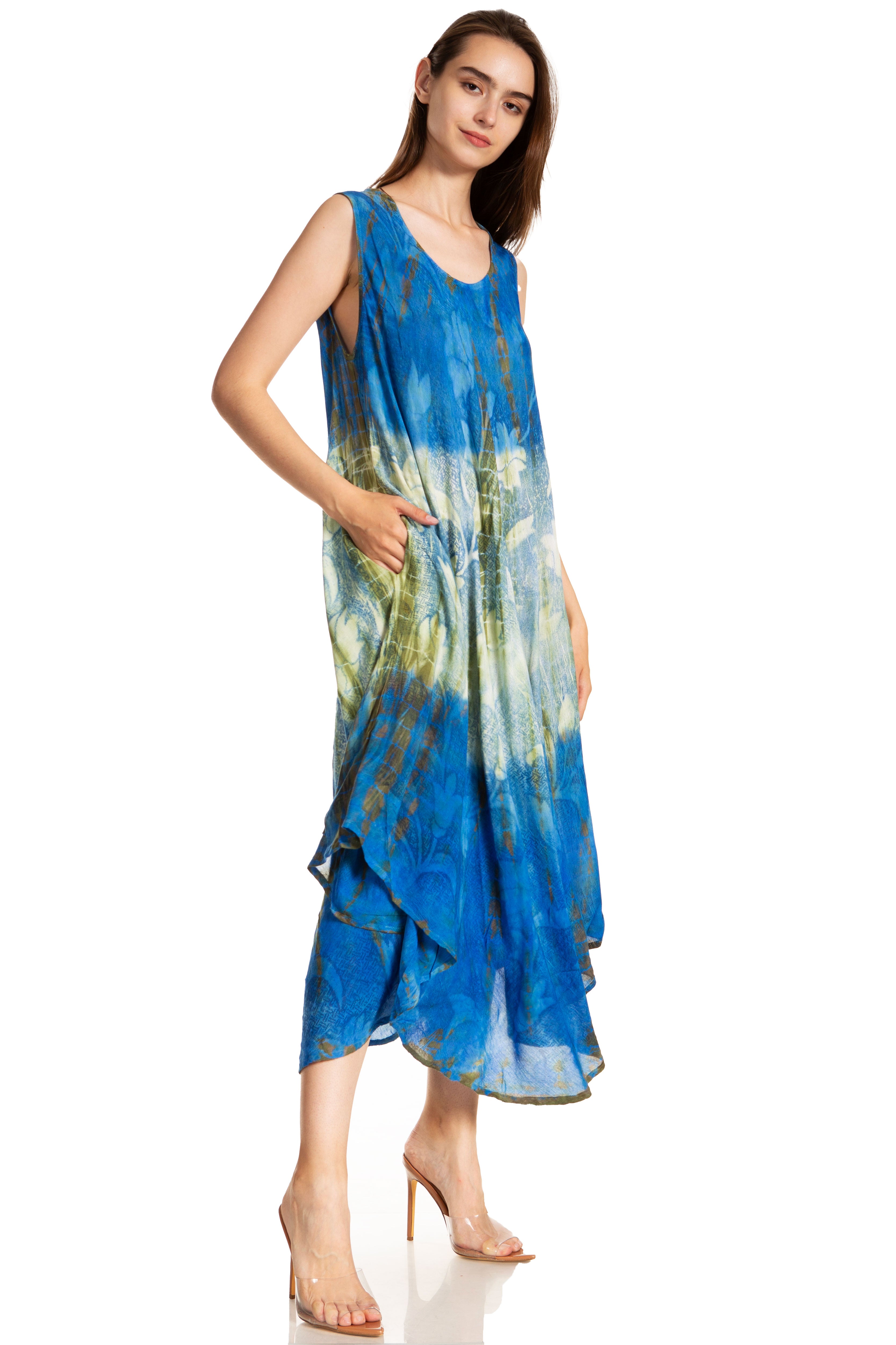 Woman wearing a blue tie-dye dress on a white background