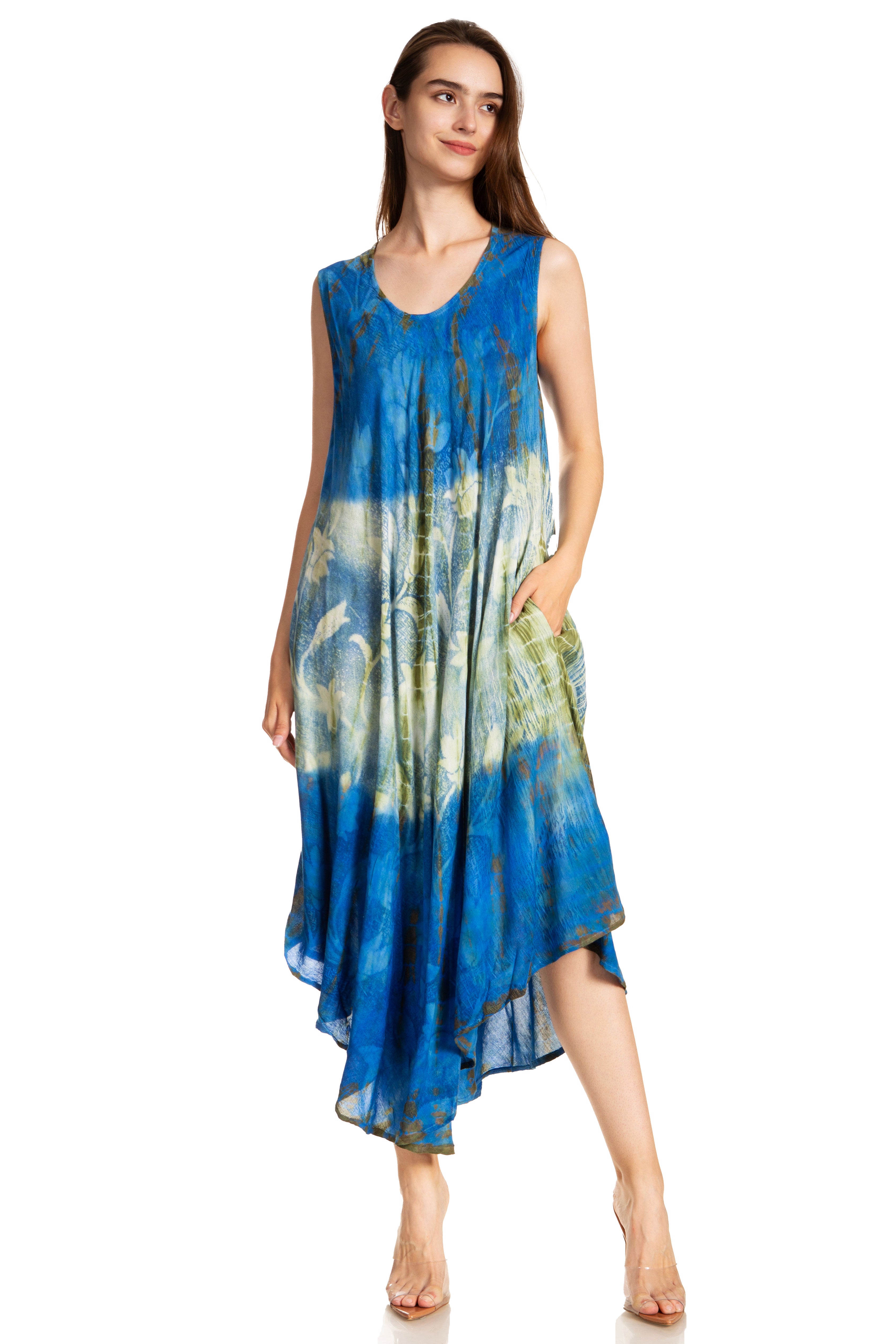 Woman wearing a blue and green tie-dye dress on a white background