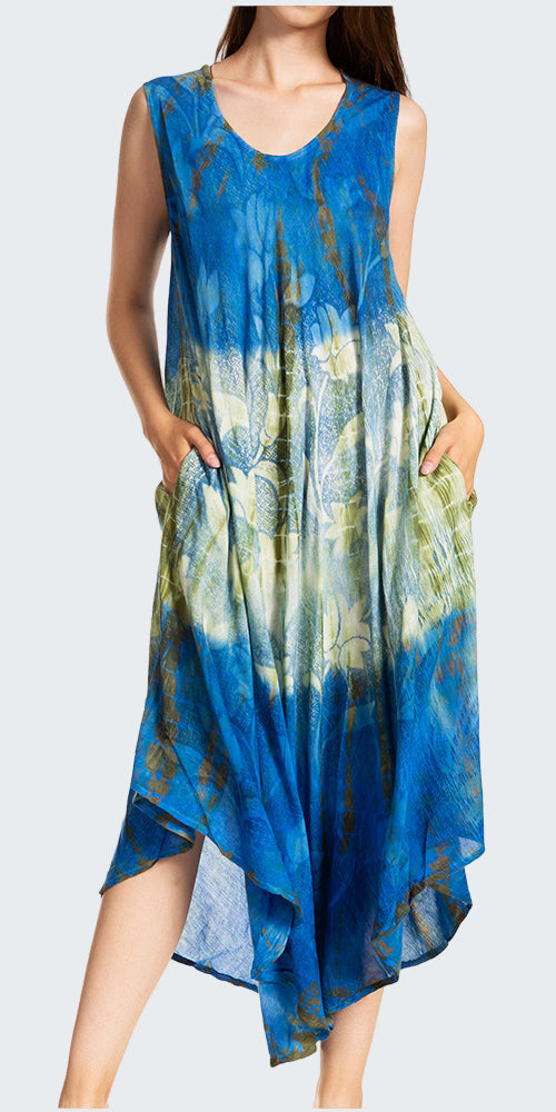 Blue and green patterned dress worn by a model on a white background