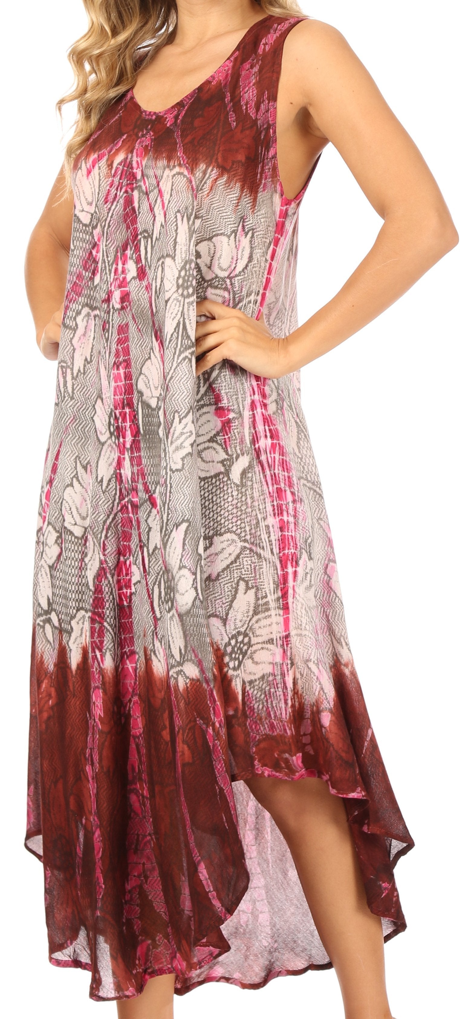 Woman wearing a patterned dress with a gradient design.