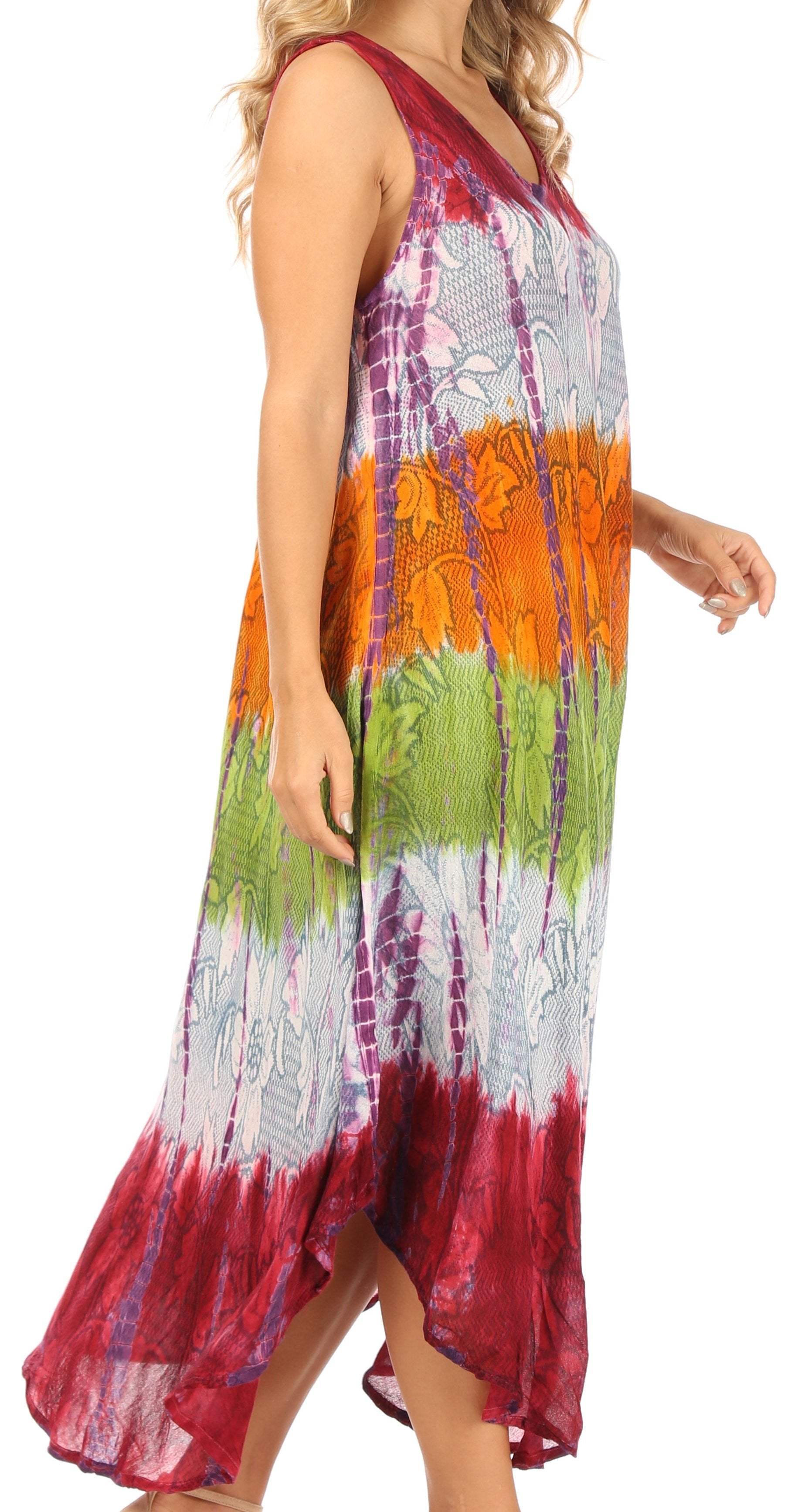 Woman wearing a colorful tie-dye dress on a white background