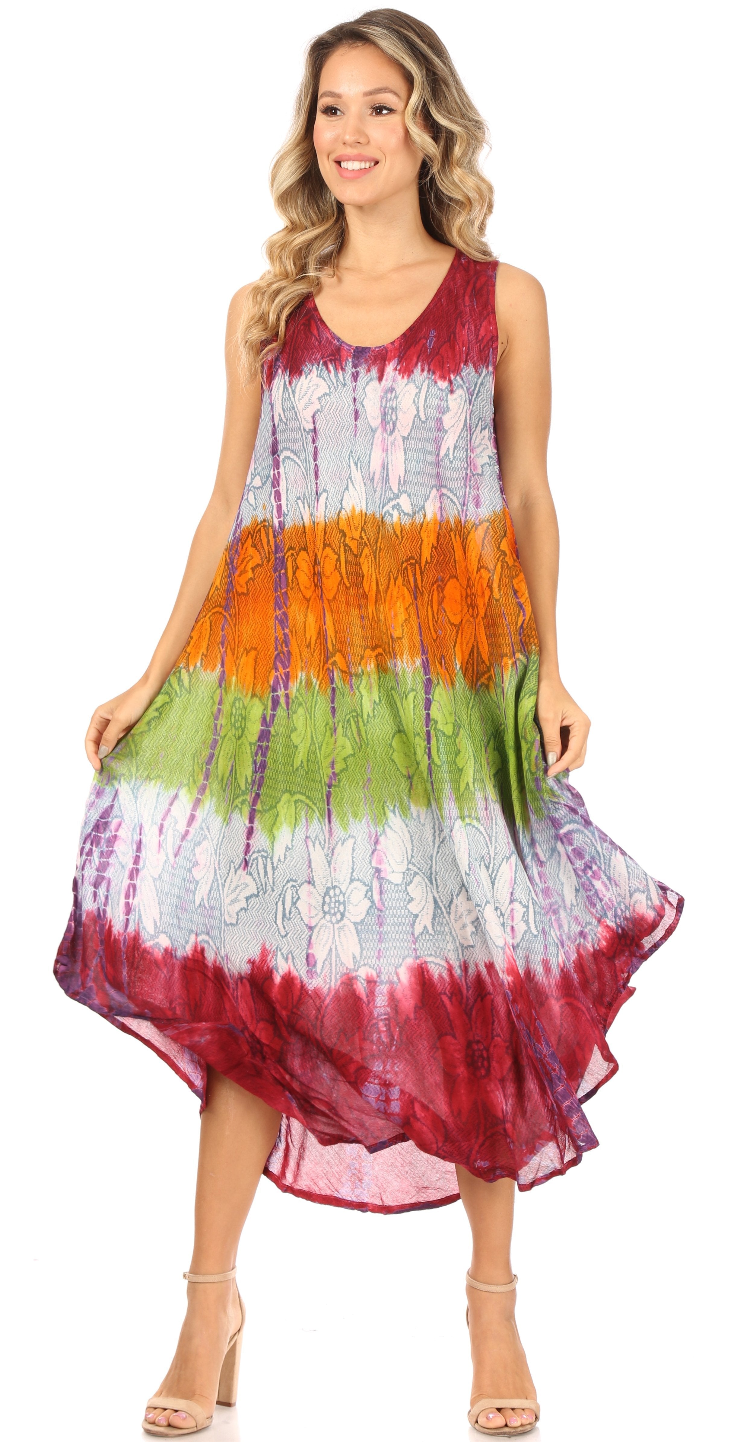 Woman wearing a colorful tie-dye dress on a white background