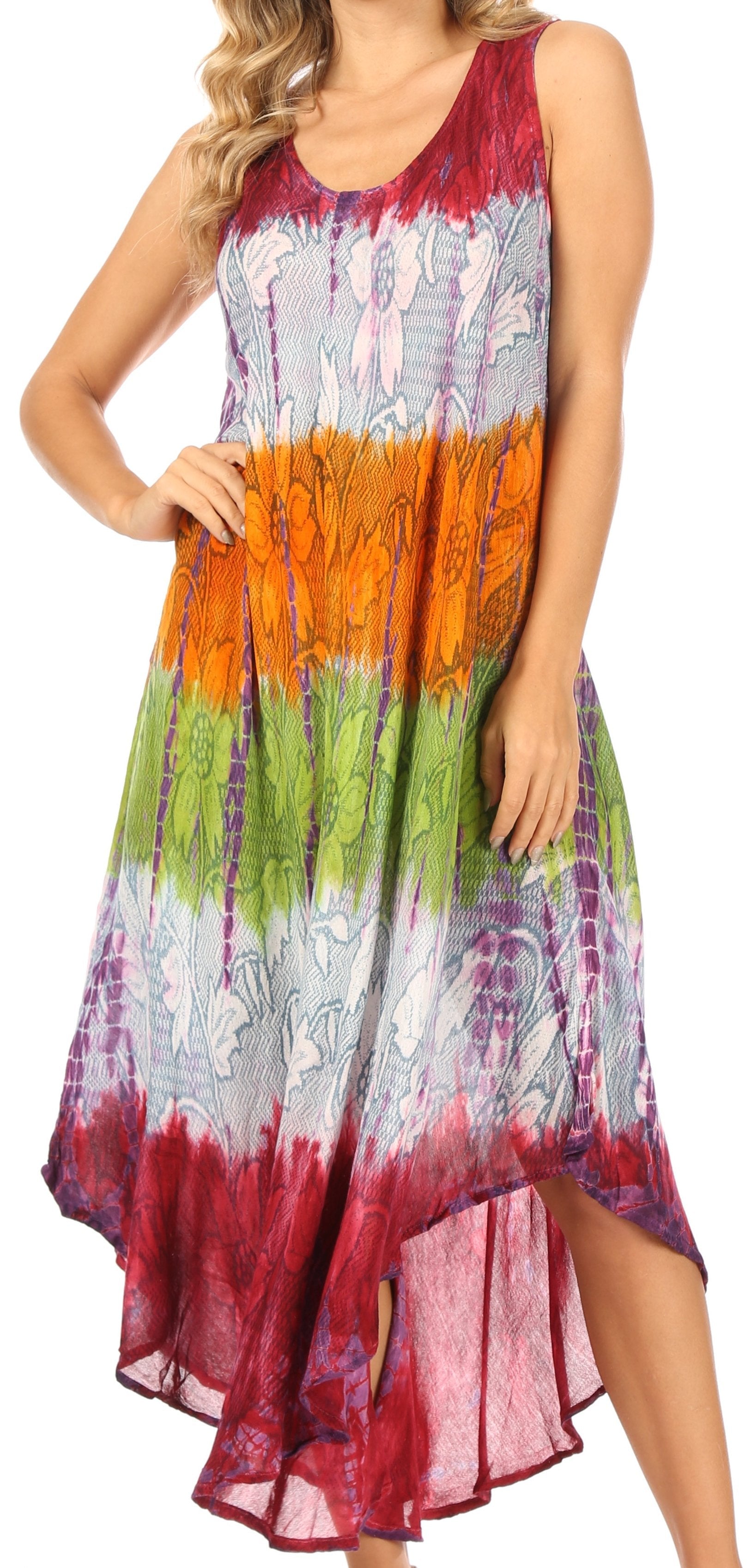 Woman wearing a colorful tie-dye dress on a white background