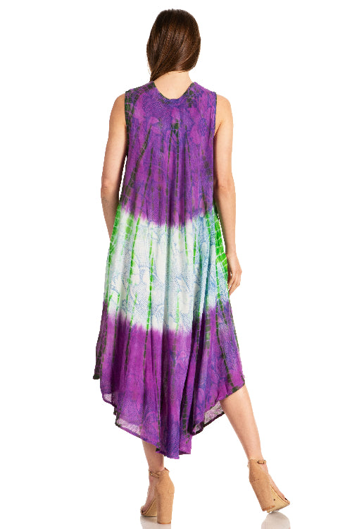 Woman wearing a tie-dye dress with purple, green, and white gradient on a white background