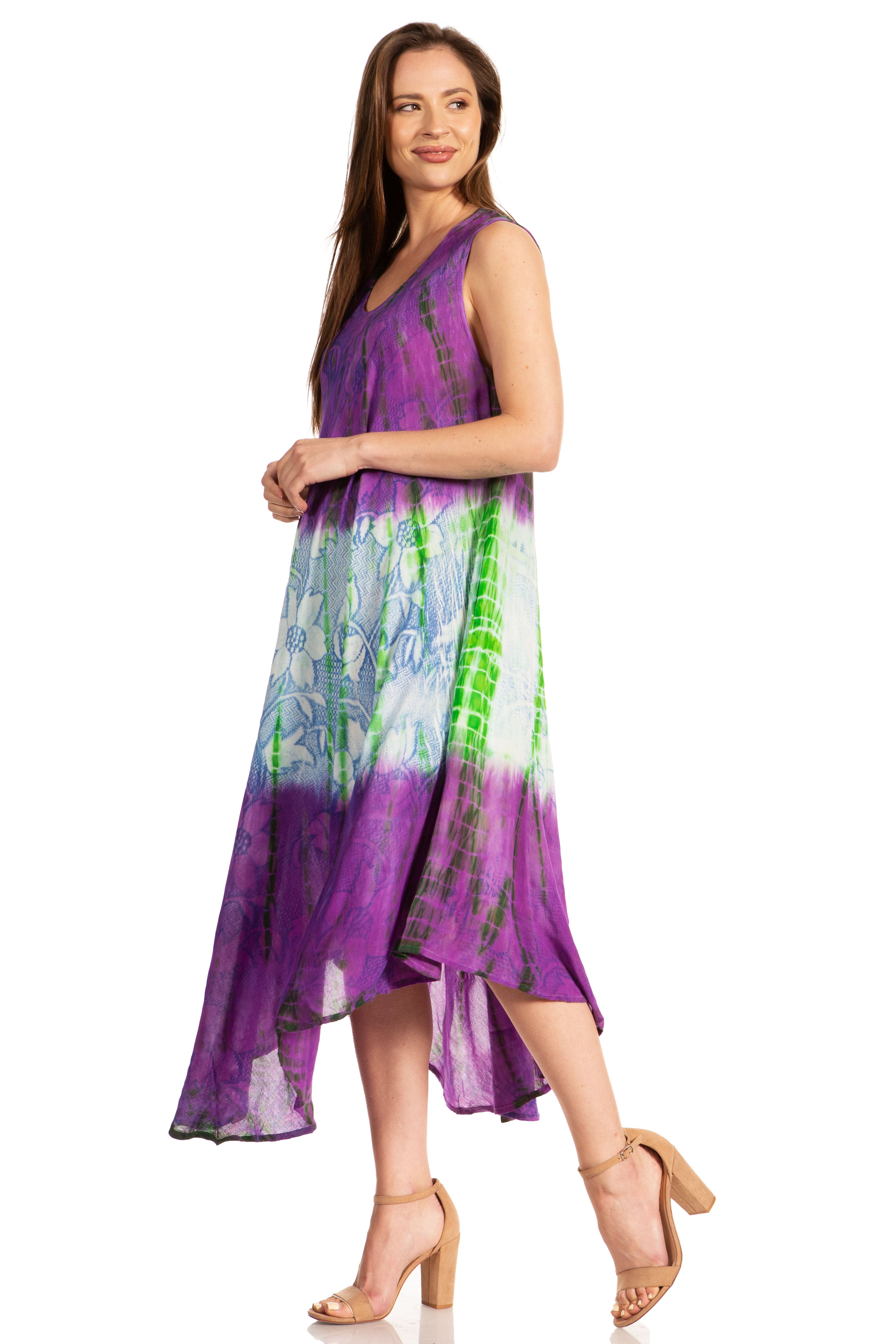 Woman wearing a purple tie-dye dress on a white background