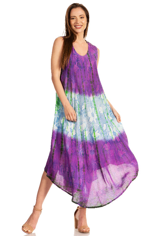 Woman wearing a tie-dye dress with purple and green gradient on a white background