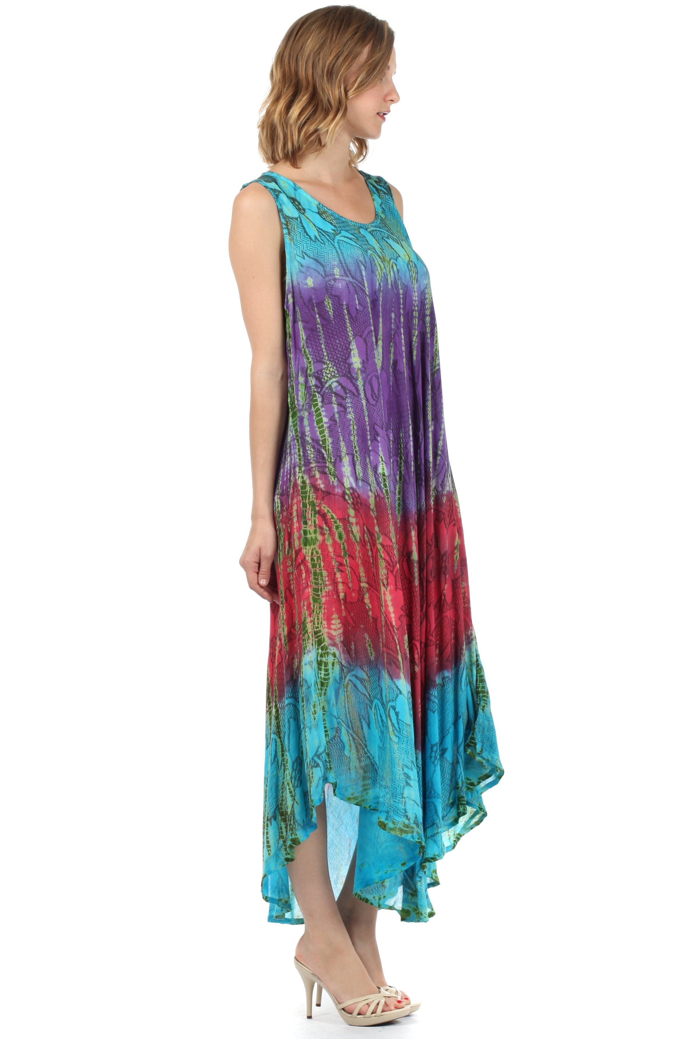 Woman wearing a tie-dye dress on a white background
