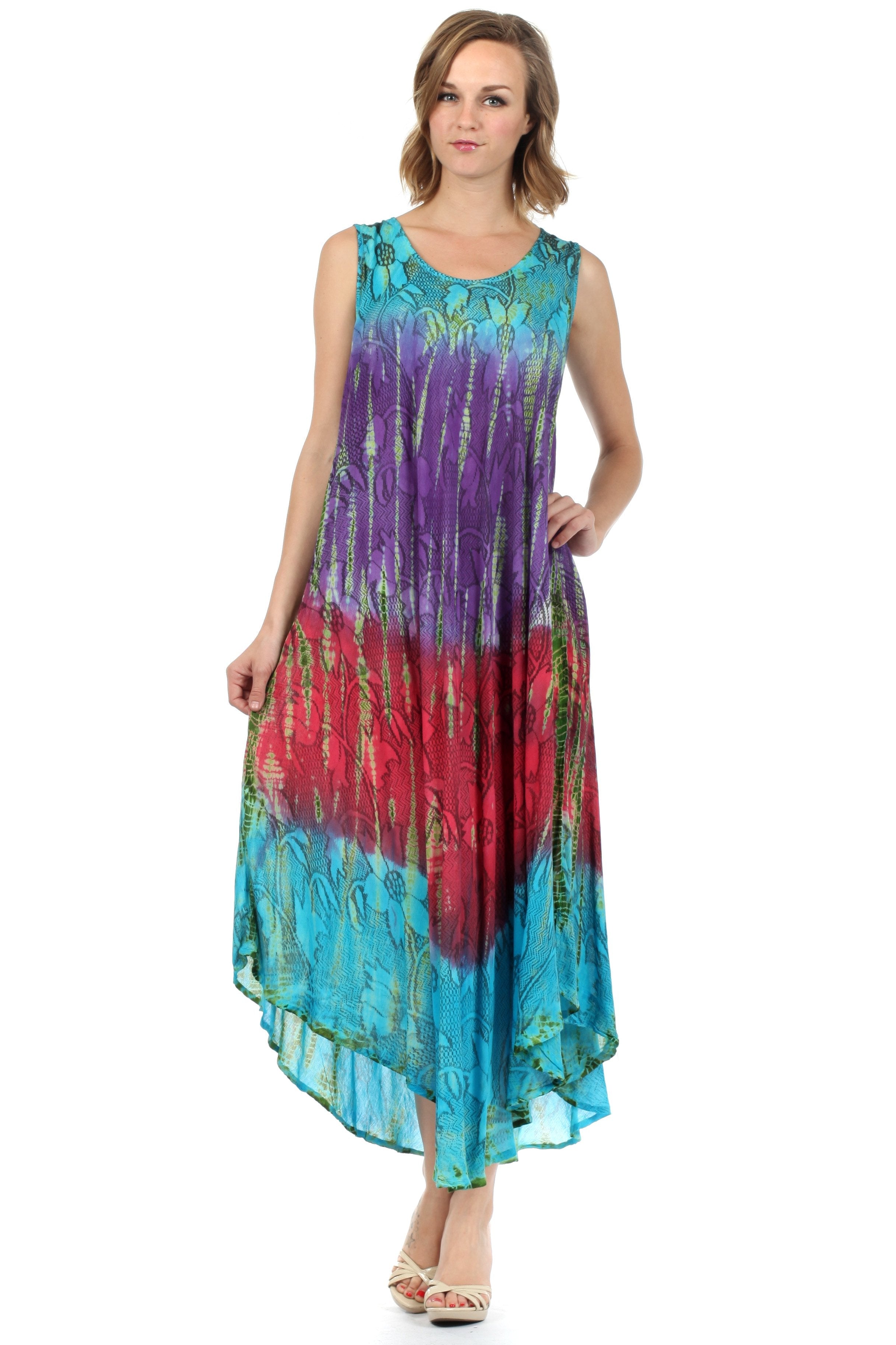 Woman wearing a colorful tie-dye dress on a white background
