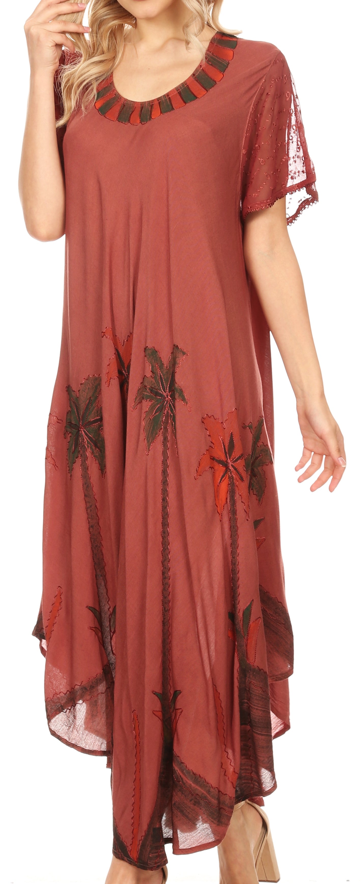 Red dress with black floral patterns worn by a model