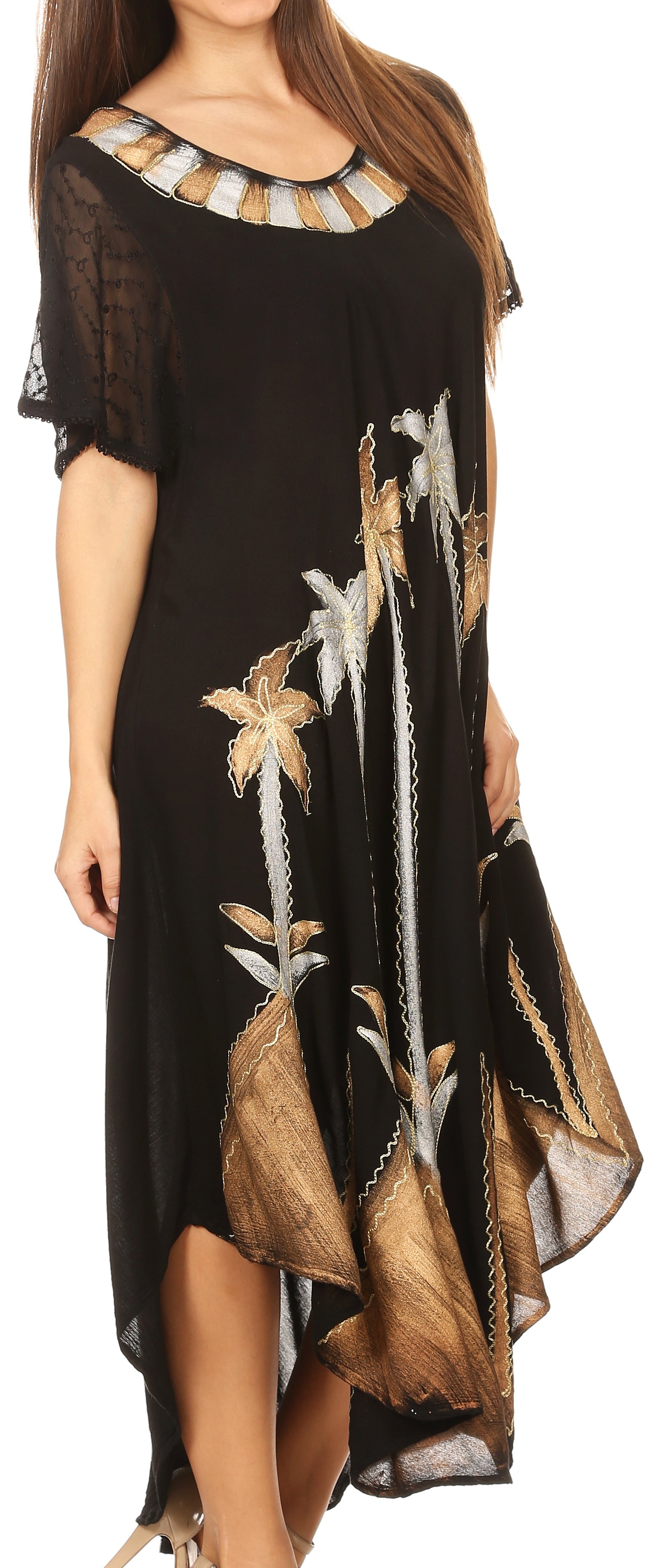 Black dress with floral patterns worn by a model