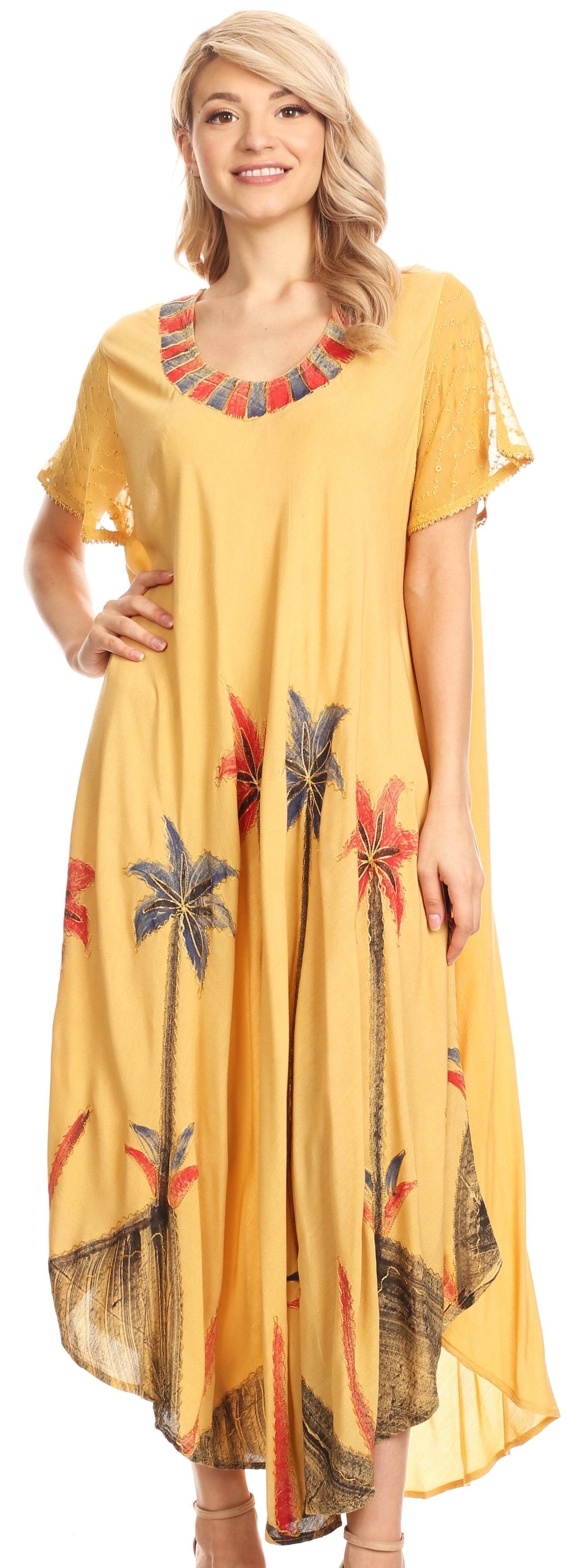 Woman wearing a yellow dress with floral patterns on a white background