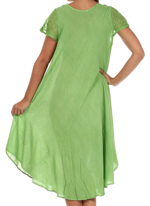 Green dress with lace sleeves on a white background