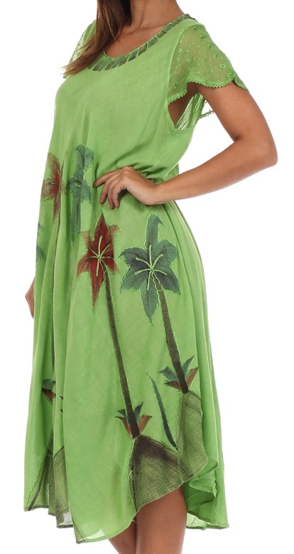 Green dress with floral patterns on a white background