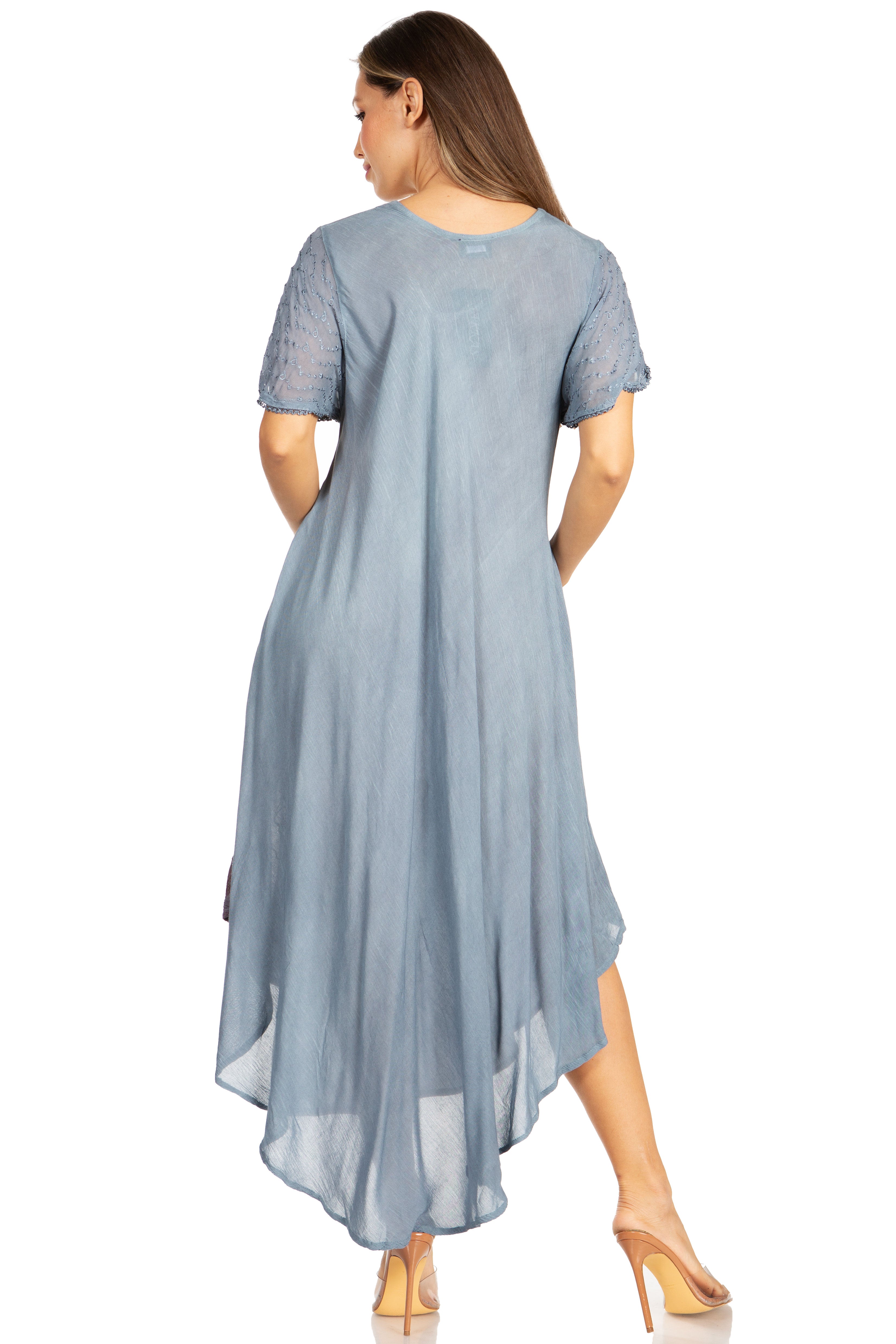 Woman wearing a light blue dress on a white background