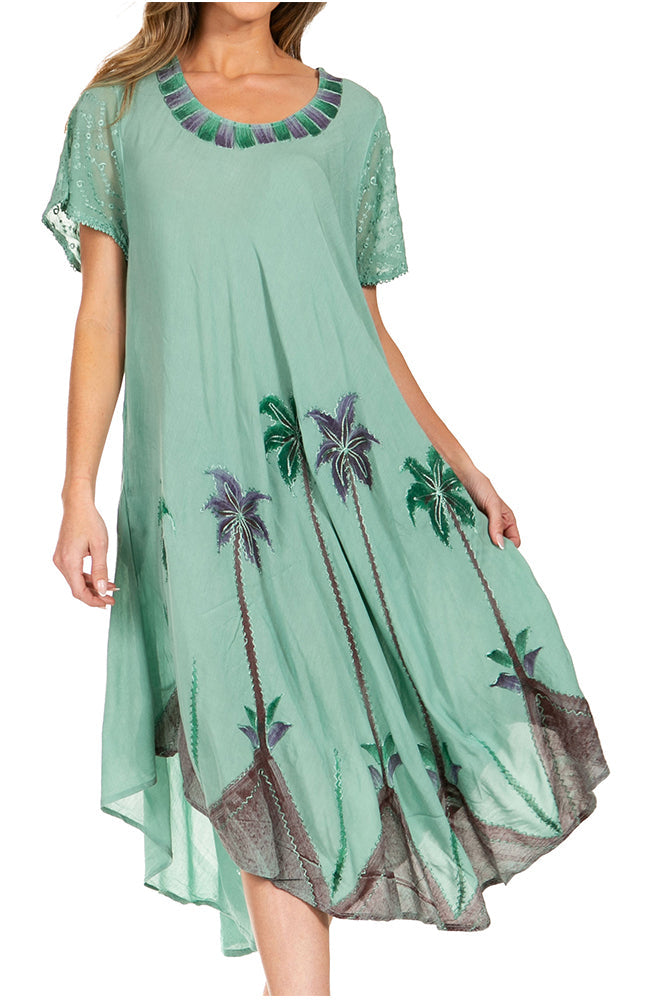 Mint green dress with palm tree design on a white background