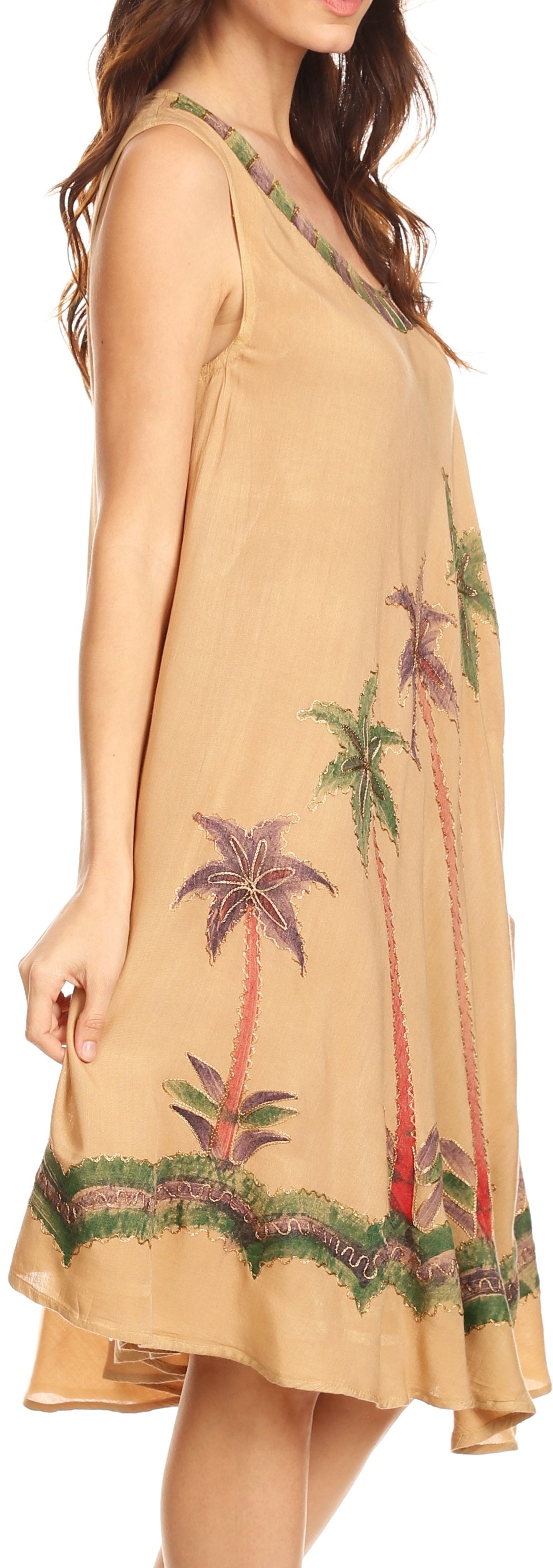 Beige dress with palm tree embroidery on a model