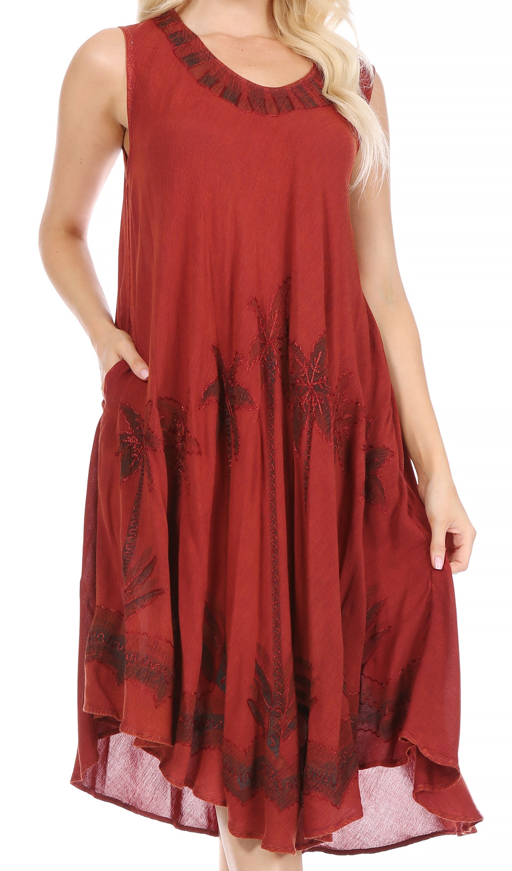 Red dress with floral embroidery on a white background