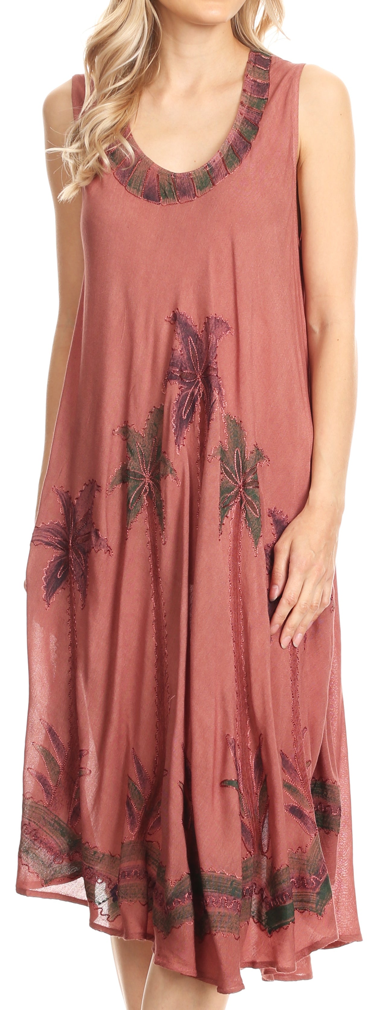 Long sleeveless dress with floral patterns on a white background